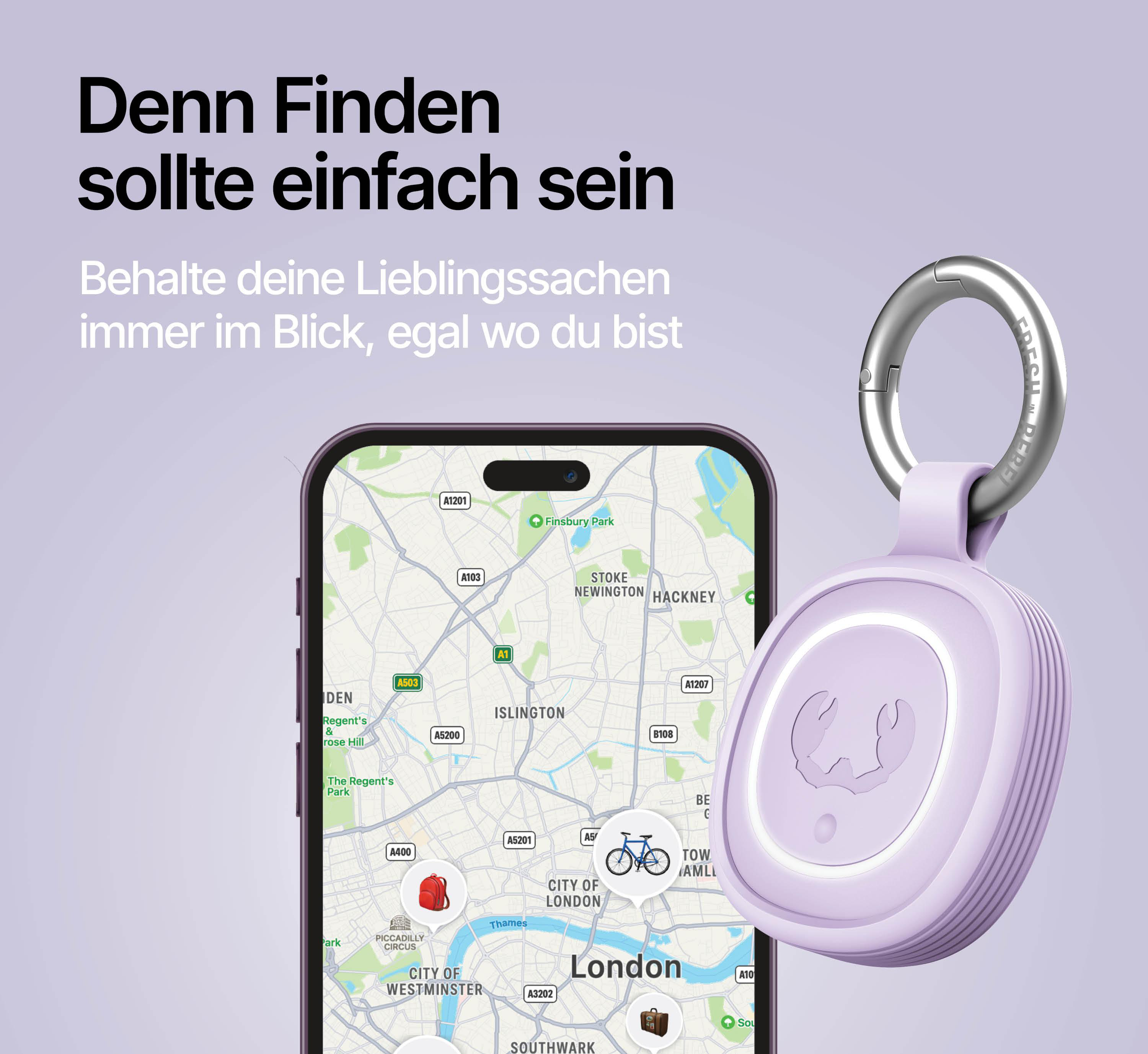 Ein lila Tracker mit Schlüsselring neben einem Smartphone mit Karte von London.