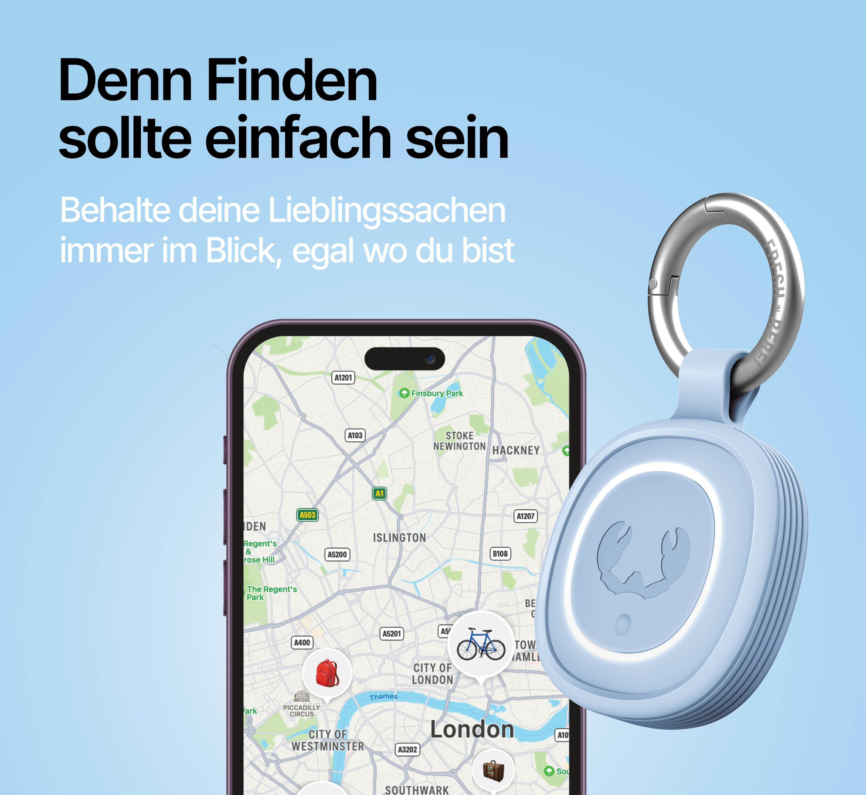 Ein hellblaues Etikett mit silbernem Ring hängt neben einem Smartphone mit einer Karte von London.