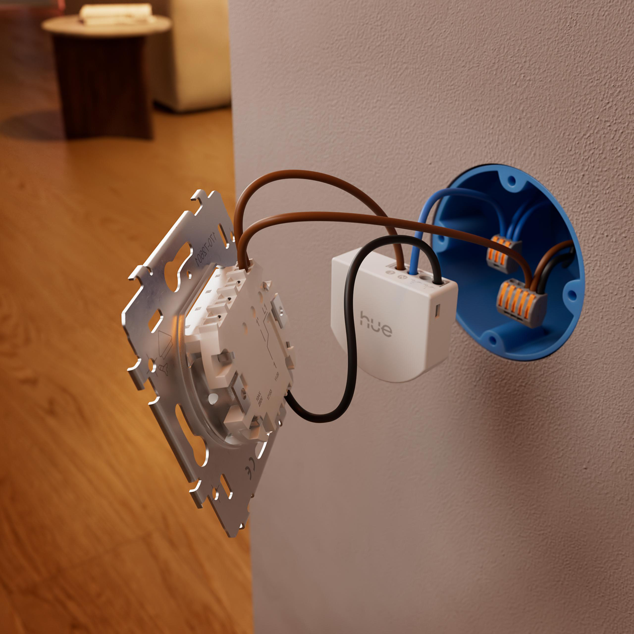 Kabel verbinden sich mit einem weißen Hue-Gerät und Schaltermechanismus.