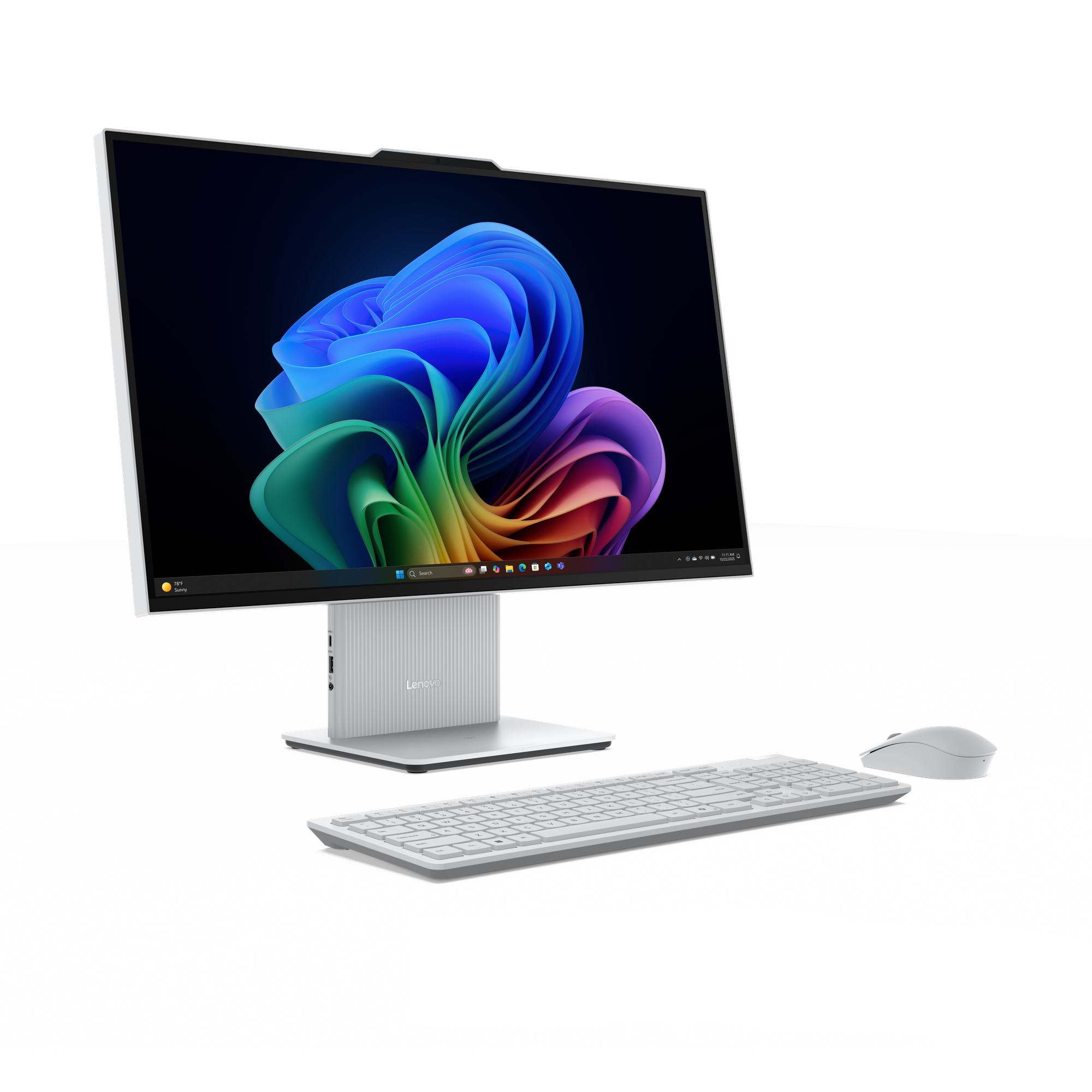 Een witte all-in-one computer met toetsenbord en muis op zwarte achtergrond.