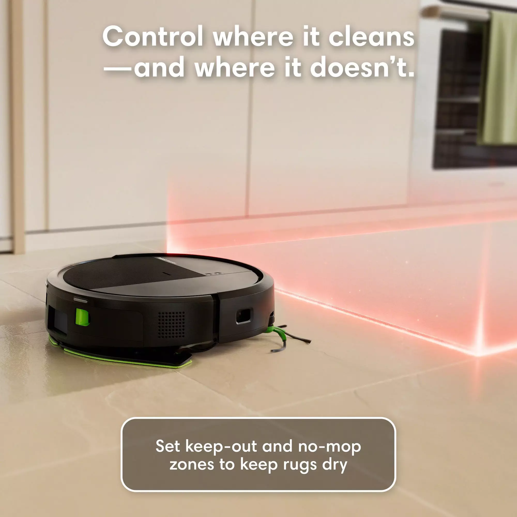 Un robot aspirateur noir se déplace sur un sol clair, délimité par des faisceaux de lumière rouge.