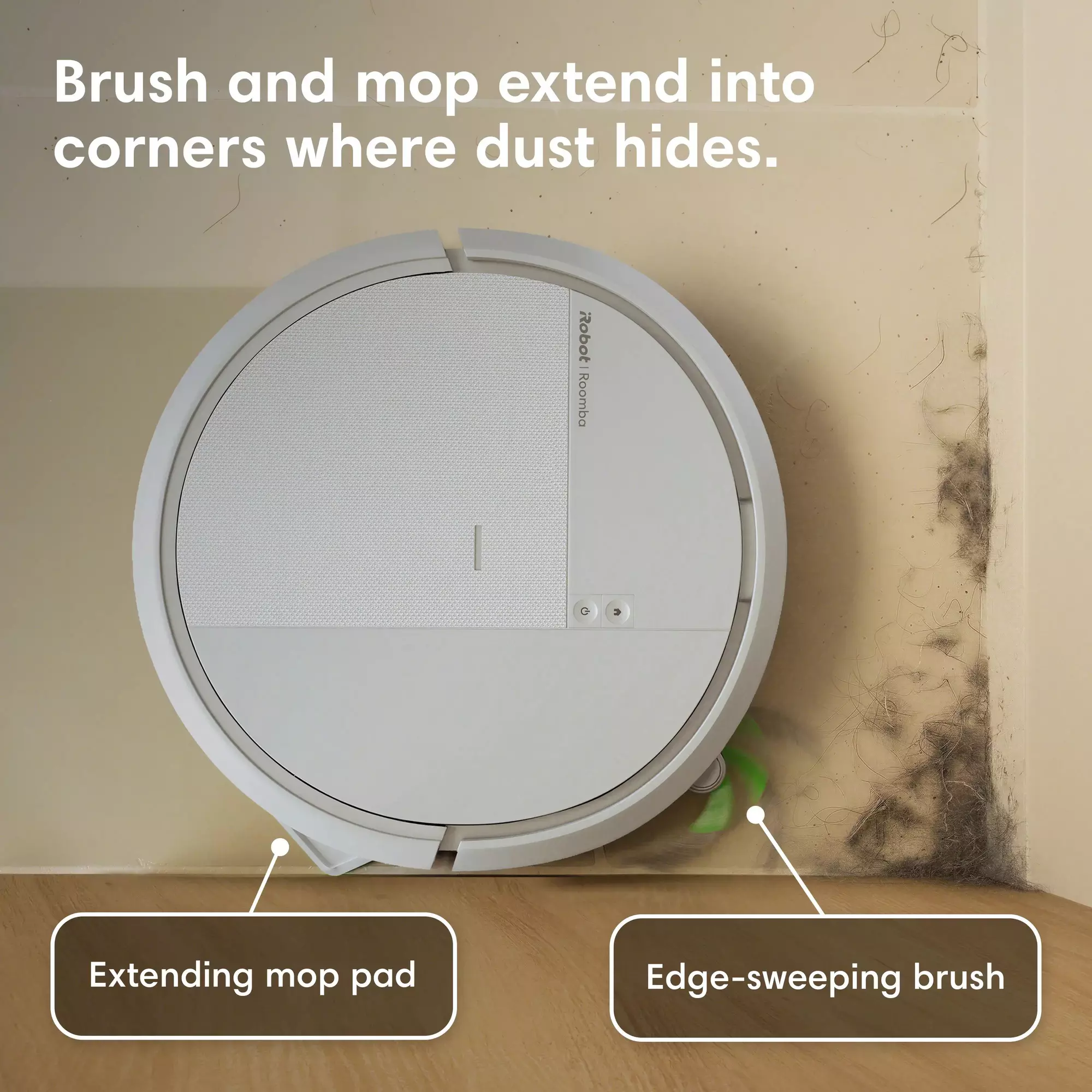 Un aspirateur robot blanc avec serpillière et brosse extensibles nettoie un coin.
