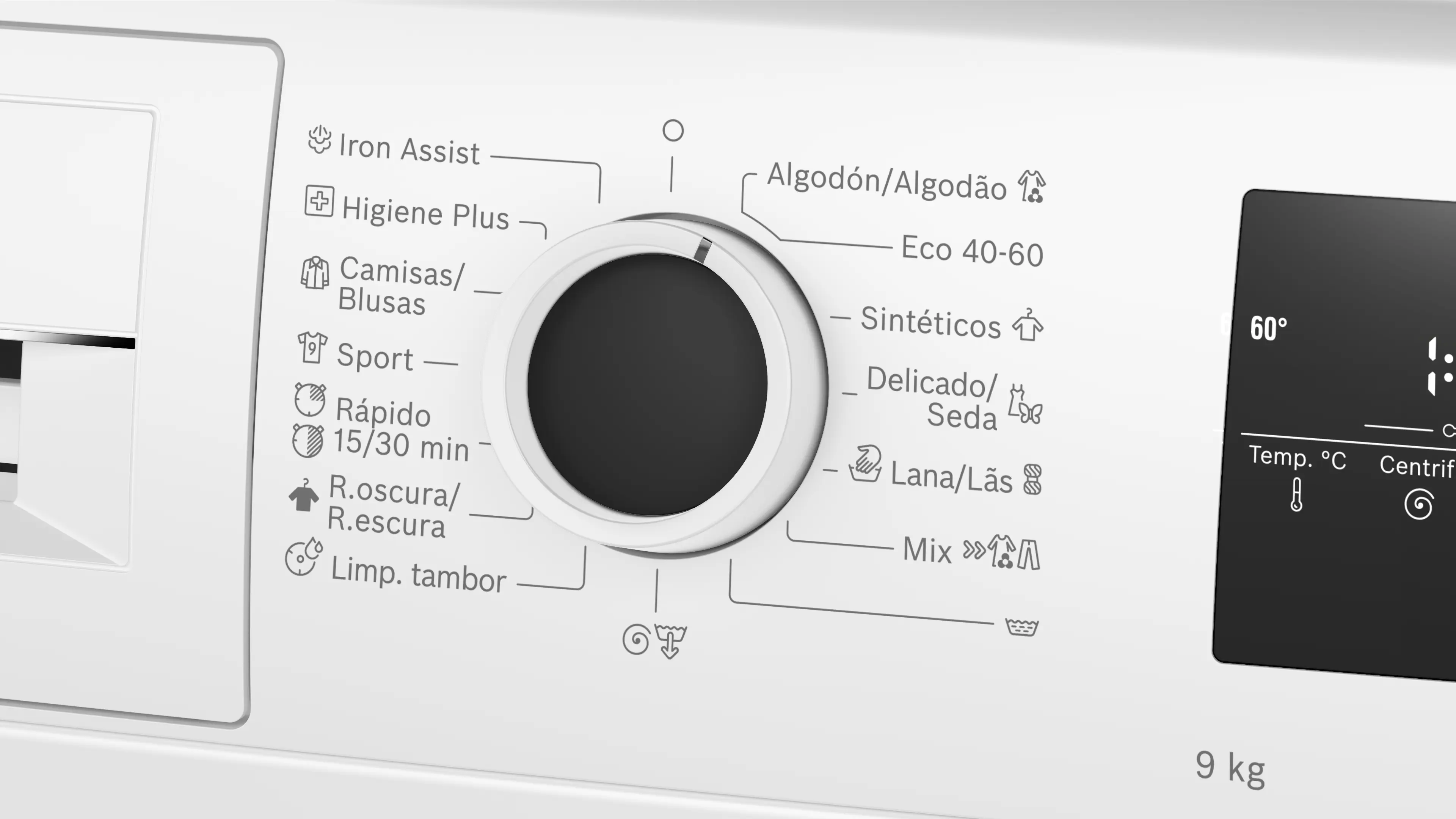 Primer plano del dial y pantalla de lavadora que muestra 60°C y ajustes de lavado.