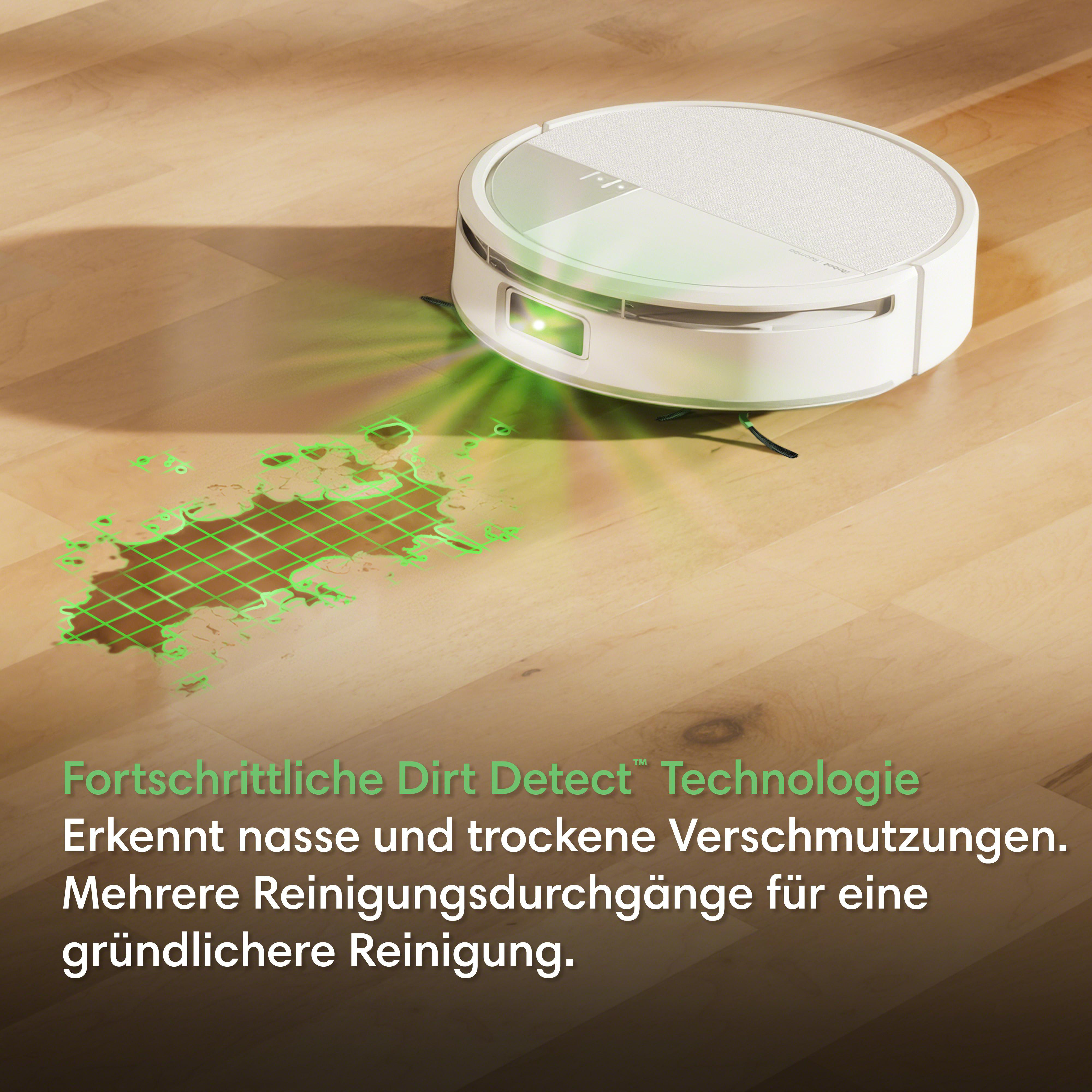 Ein weißer Saugroboter mit grünen Laserlinien auf nassem Boden.