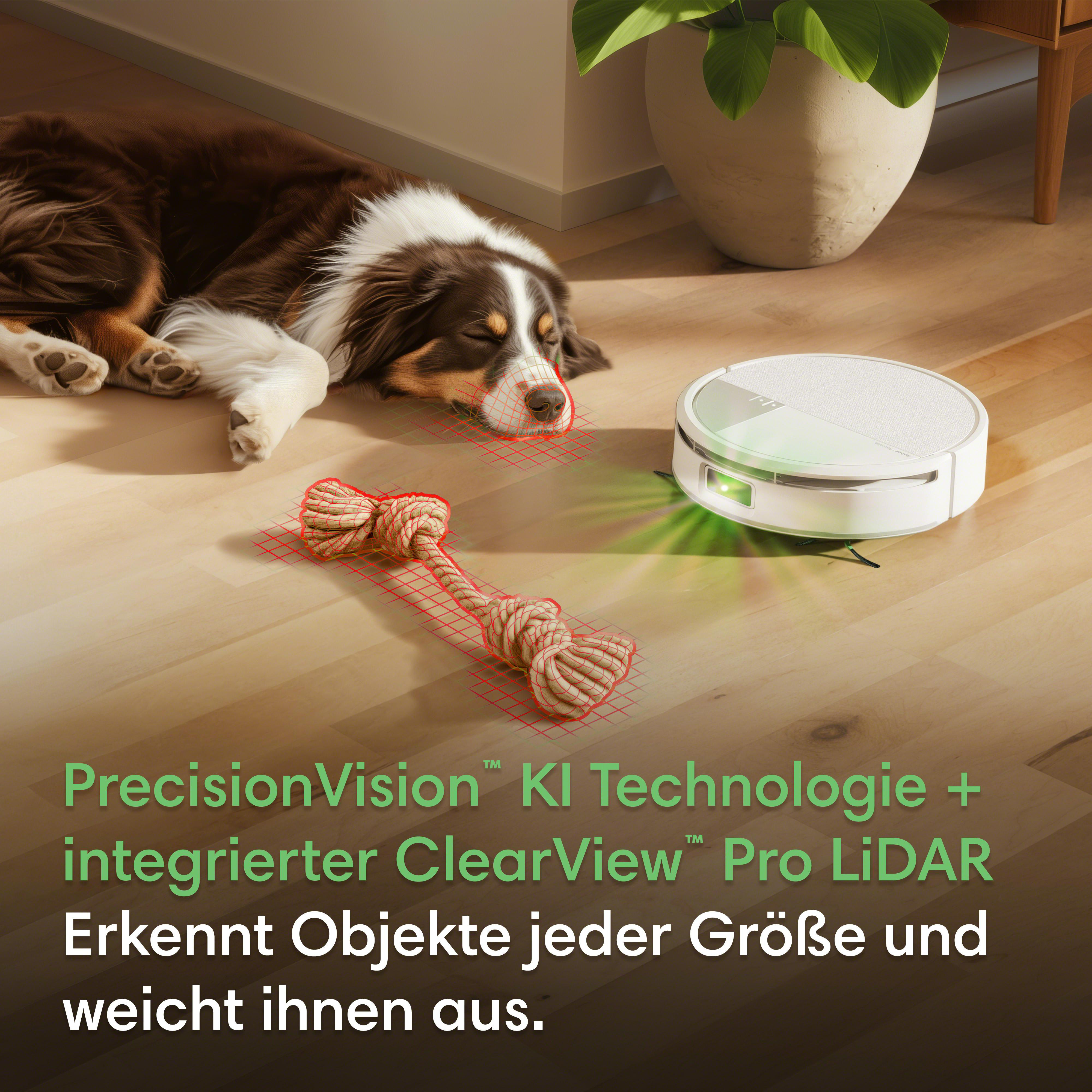 Ein Saugroboter scannt einen Hund und ein Seilspielzeug auf einem Holzboden.