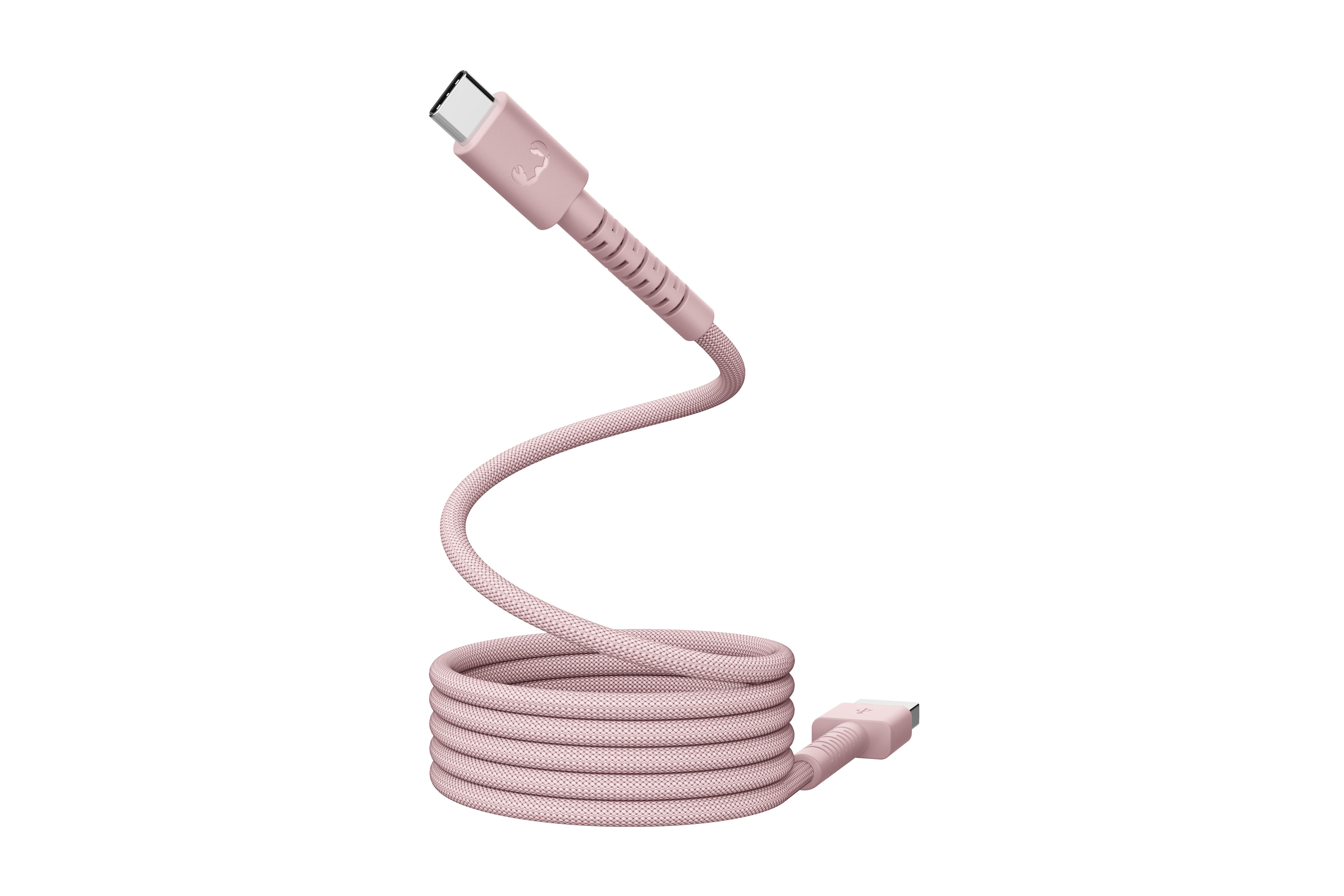 Ein rosa USB-C-Kabel mit Stoffummantelung, das auf sich selbst gewickelt ist.