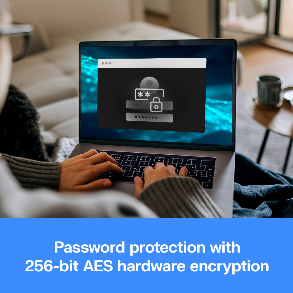 Persona digita su laptop con schermo di inserimento password.