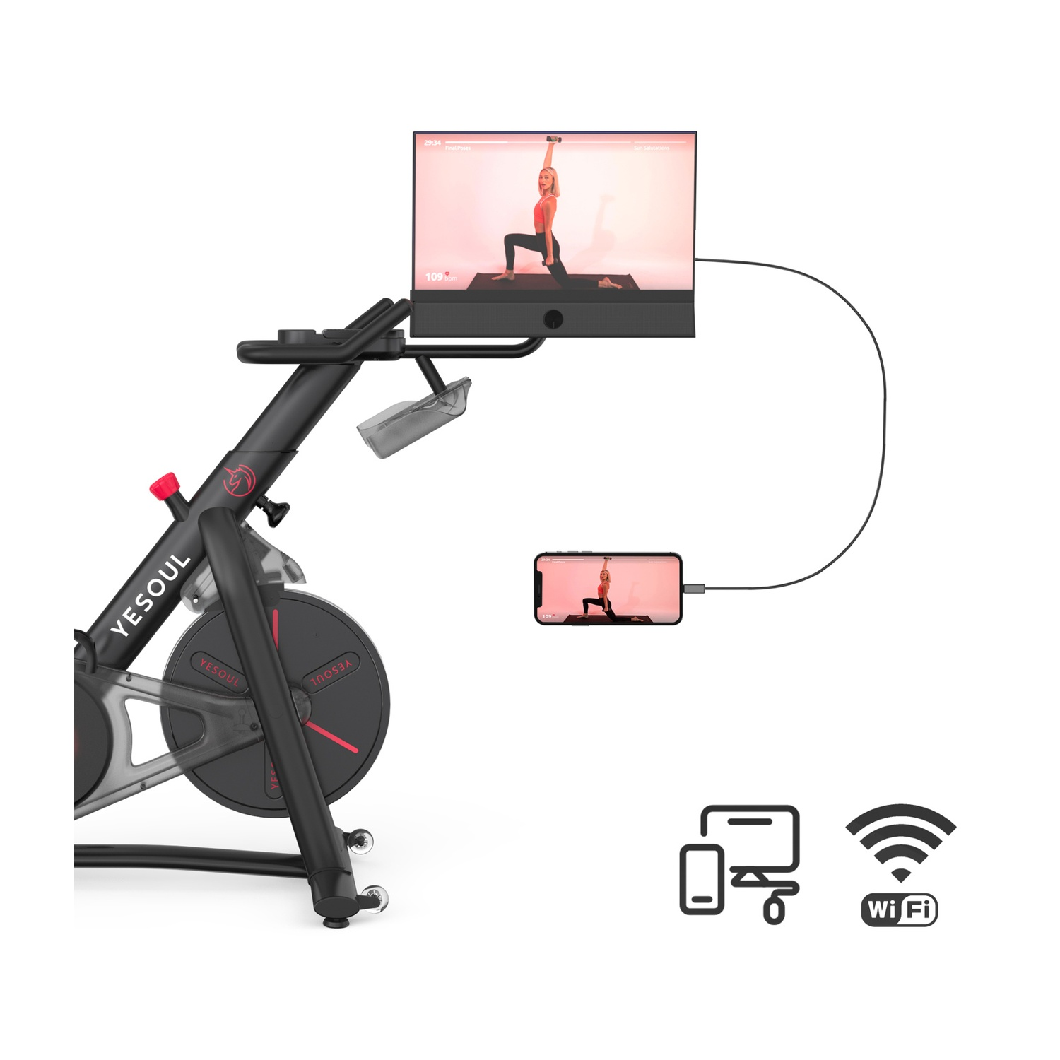 Cyclette nera con schermo che mostra una donna che fa yoga, collegata a un telefono.