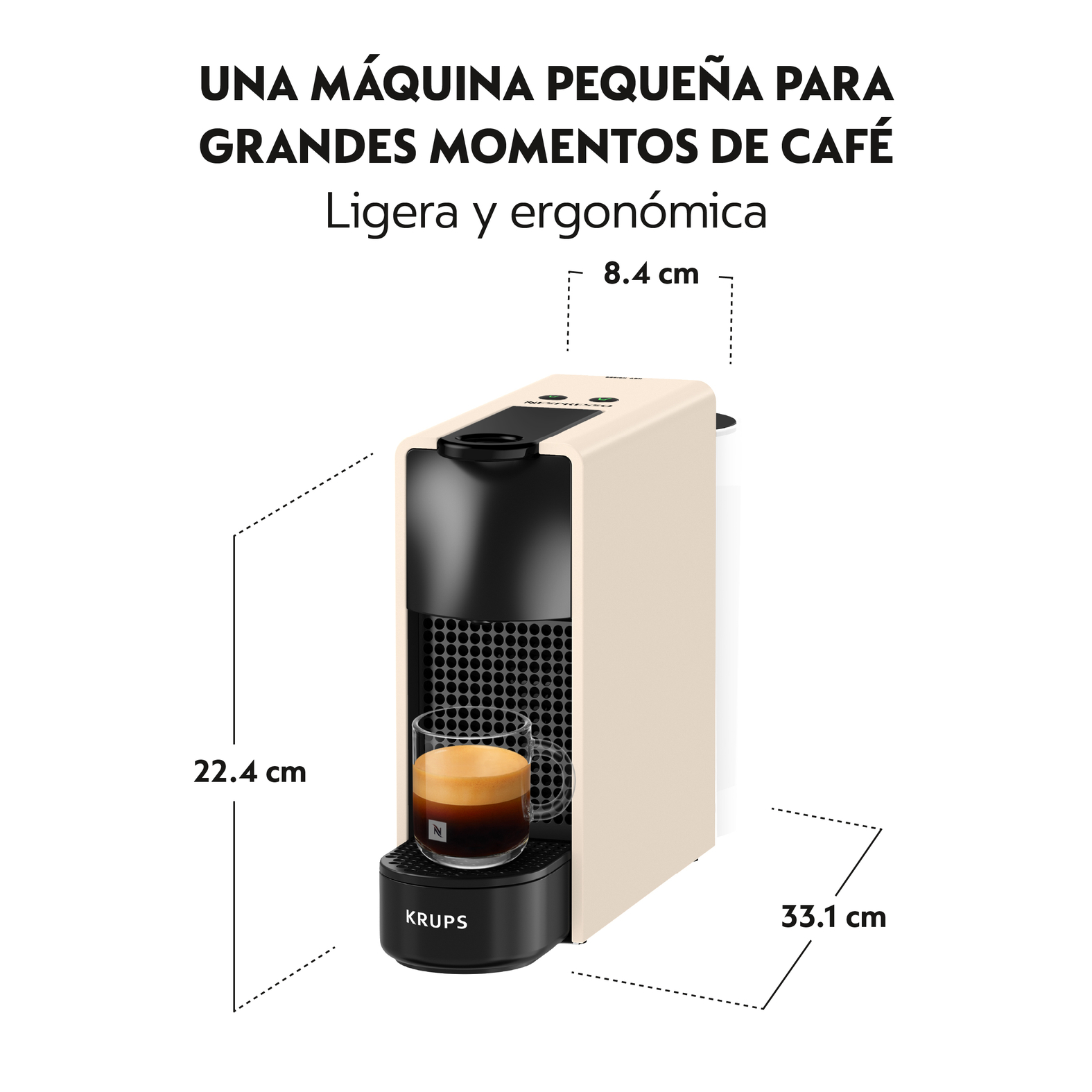 Cafetera compacta beige con taza de espresso, se muestran las dimensiones.