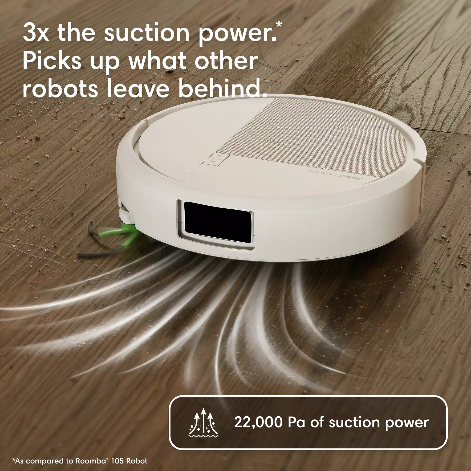 Un robot aspirateur blanc sur un plancher de bois, nettoyant les débris.