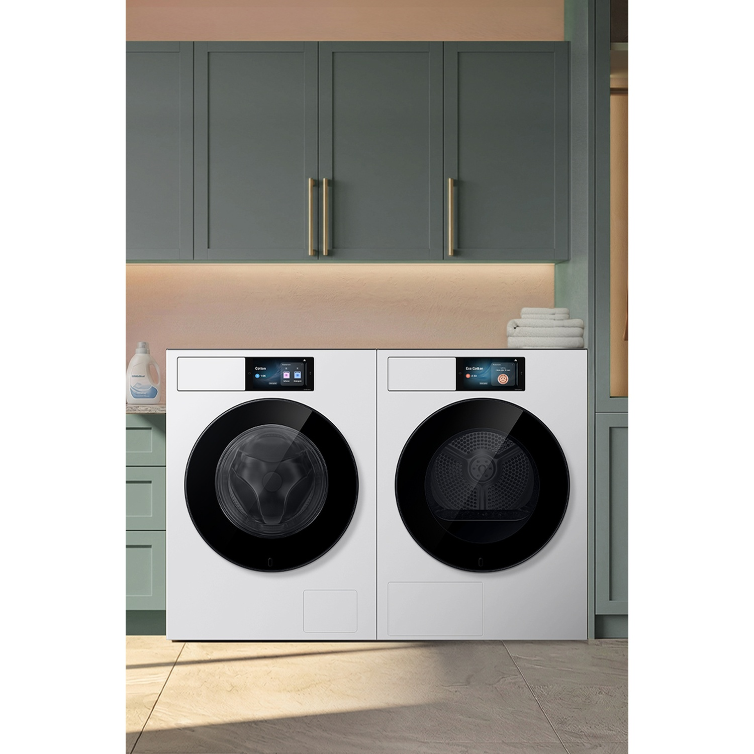 A white dryer and washing machine stand side-by-side.