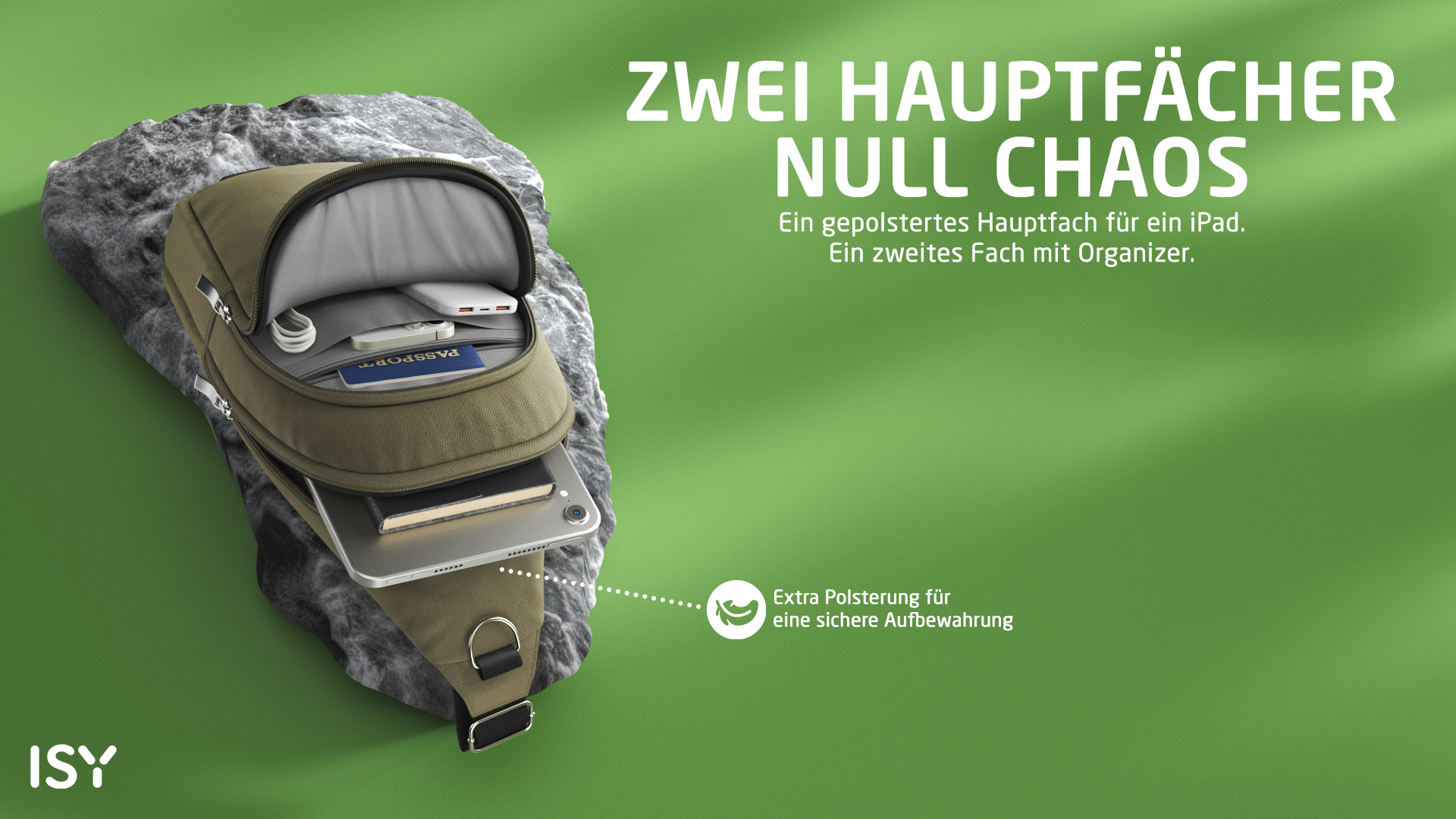 Eine olivgrüne Umhängetasche liegt auf einem Stein. Sie enthält ein iPad, ein Handy, ein Ladekabel und einen Pass.