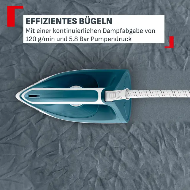 Ein tealfarbenes Bügeleisen mit weißem Griff auf grauem Stoff.