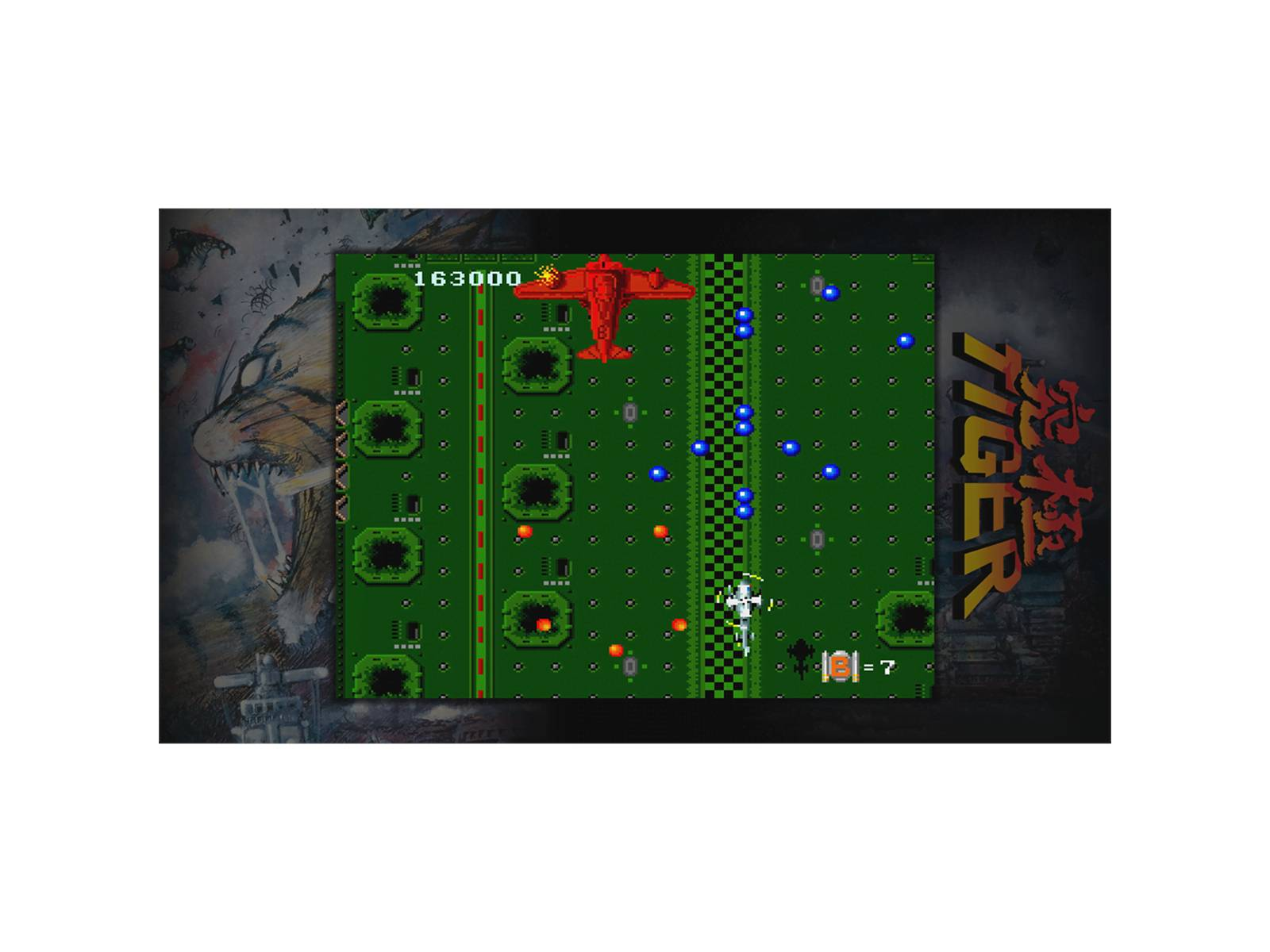 Un avión rojo vuela hacia abajo en una pantalla de juego verde con orbes azules.
