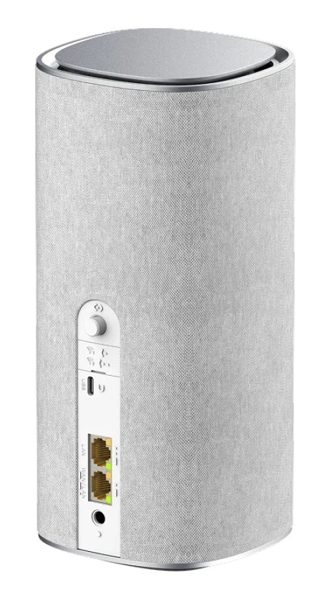 Szary, materiałowy cylinder z srebrną górą i bocznymi portami.
