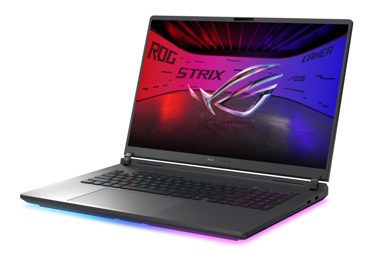 Ciemny laptop gamingowy z podświetlaną klawiaturą i logo ROG na ekranie.