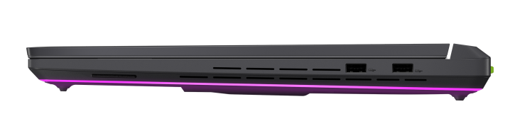 Czarny bok laptopa z portami USB i fioletowym podświetleniem.