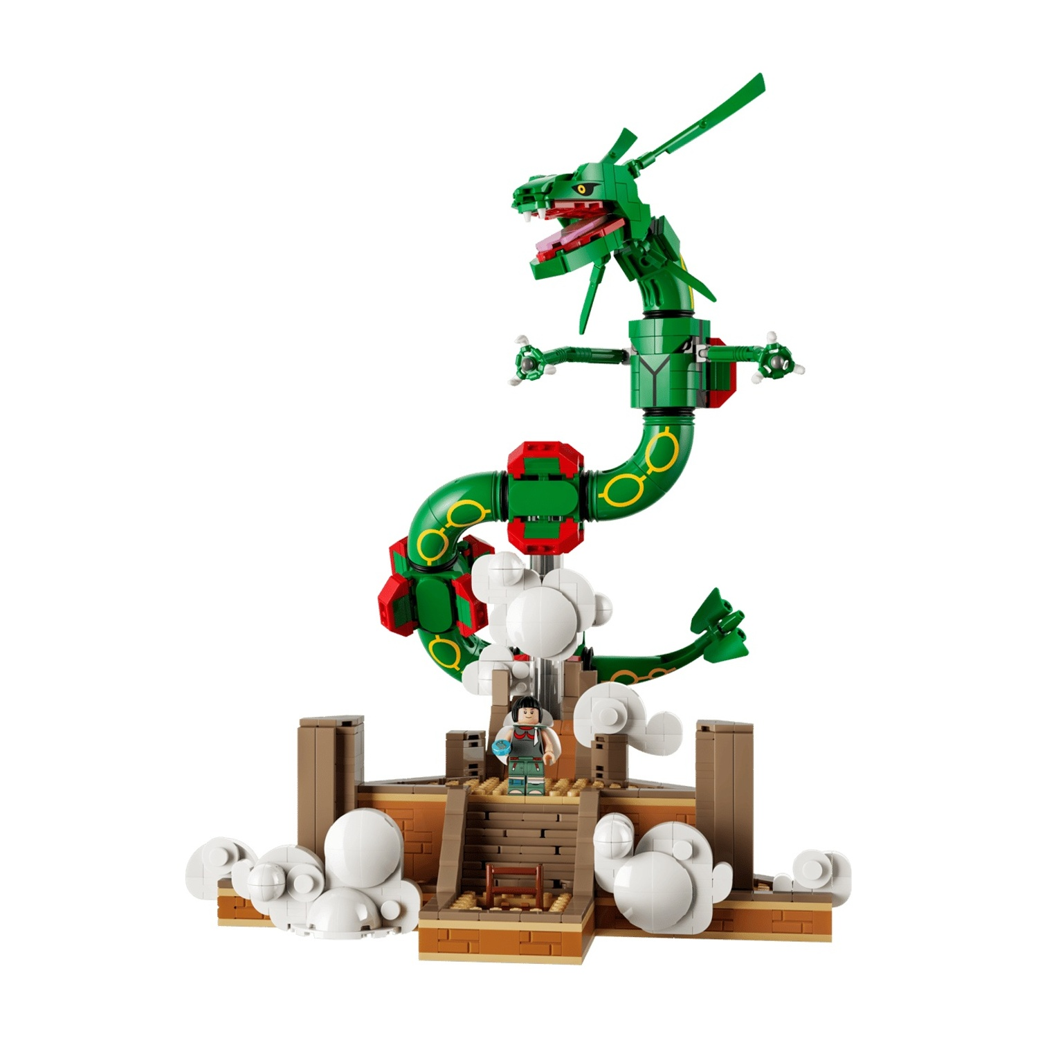 Un drago LEGO verde sopra una struttura antica con una figura.
