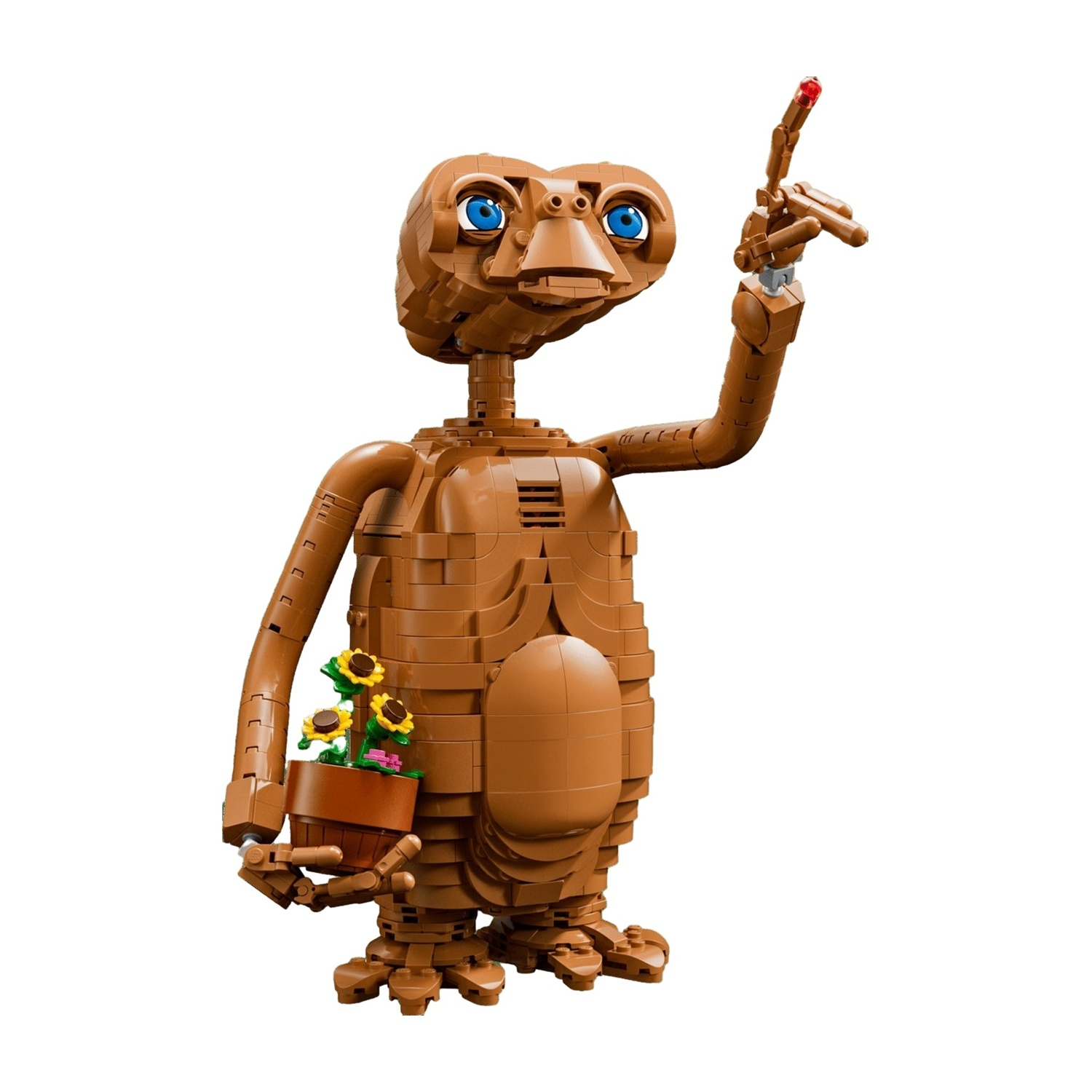 Una figura marrone Lego di E.T. tiene un vaso di fiori gialli. Punta un dito verso l'alto.