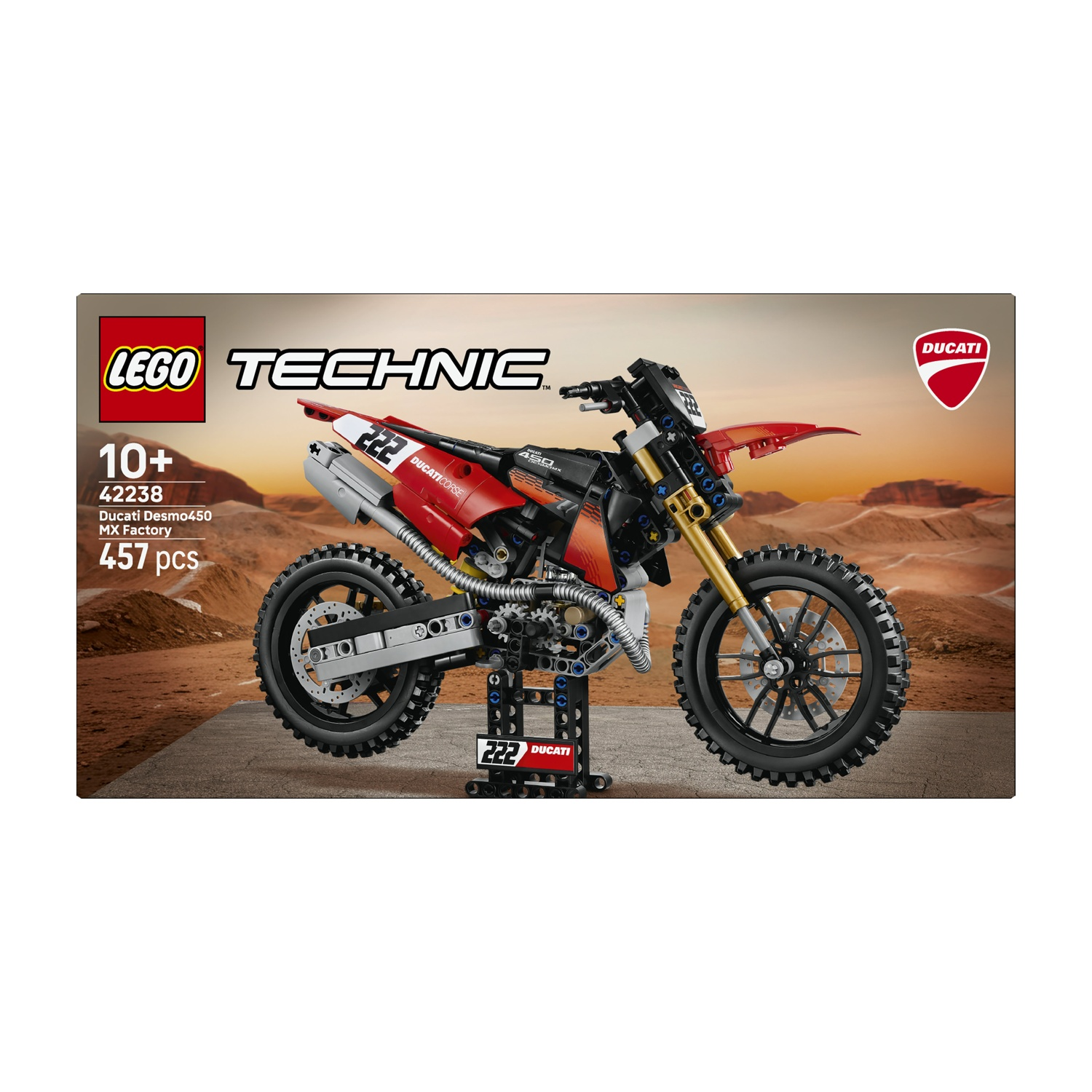 Modello di moto LEGO Technic Ducati su un supporto di fronte a un paesaggio desertico.