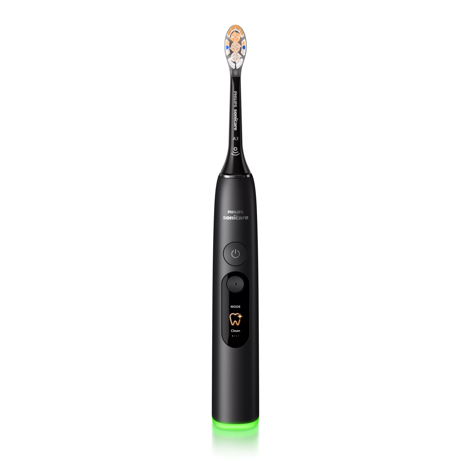 Een zwarte elektrische tandenborstel met een verlichte groene voet.