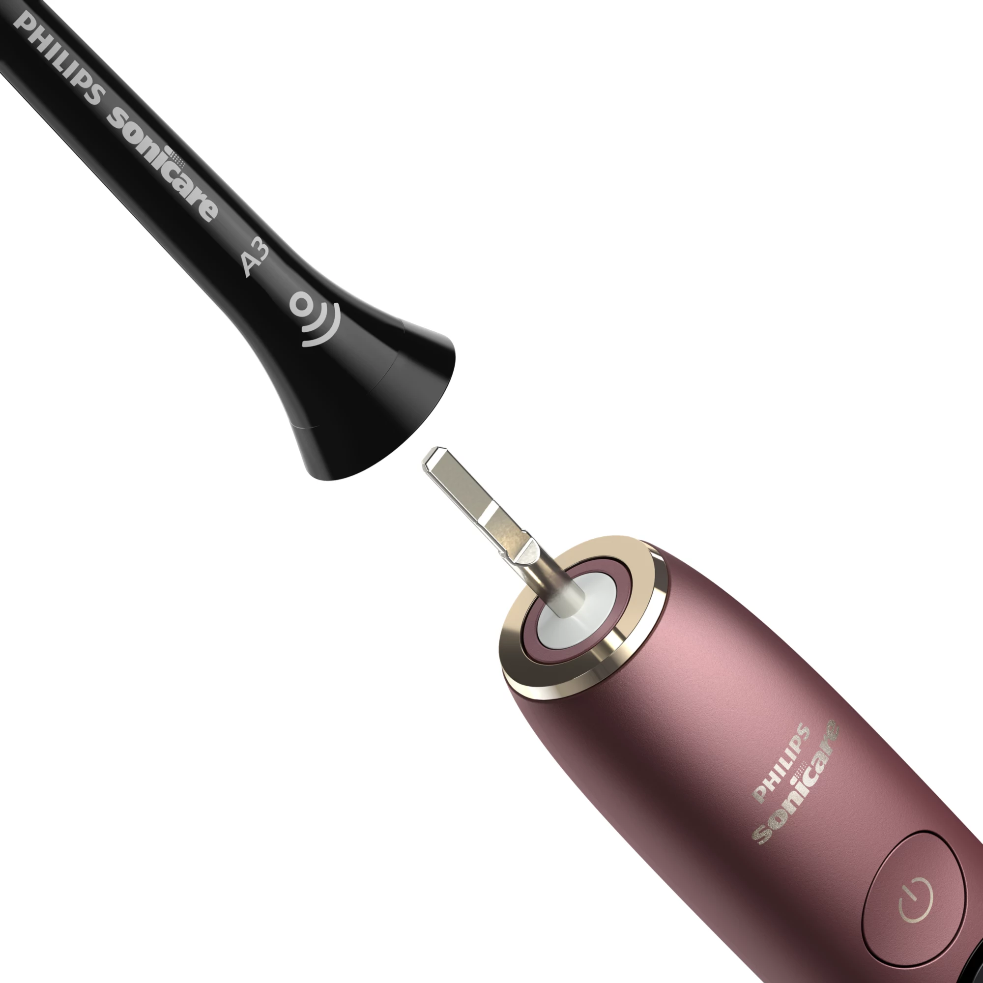 Czarna główka Philips Sonicare A3 jest przyczepiana do różowo-złotej rączki.