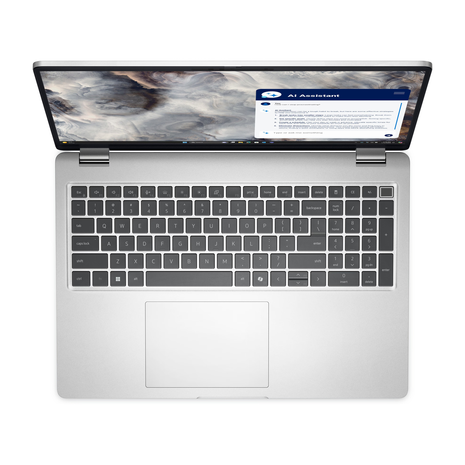 Un laptop argentato è aperto, mostrando uno schermo con un'interfaccia di assistente AI.