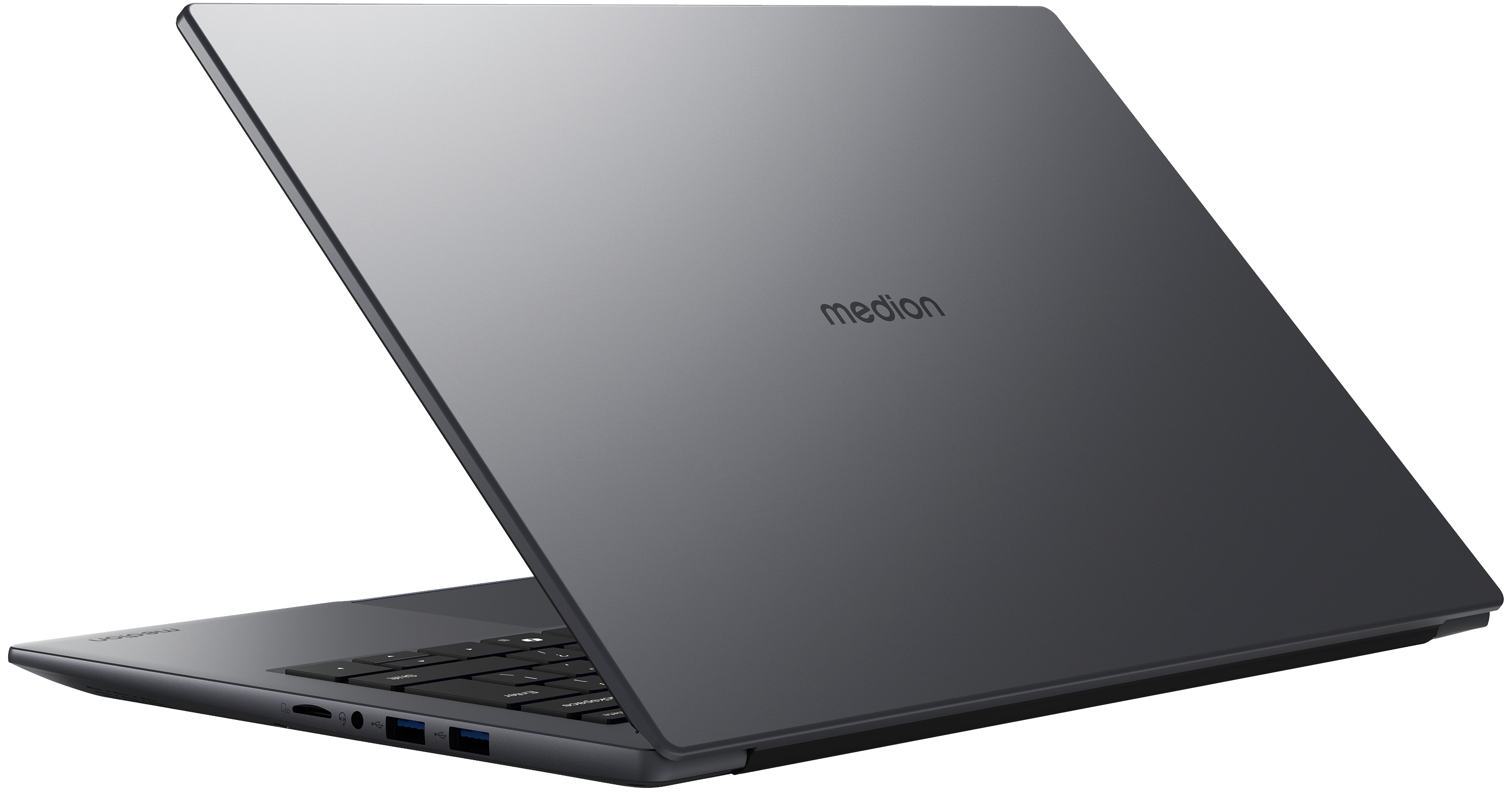 Ein geschlossener, grauer Medion Laptop mit beleuchteten Tasten auf schwarzem Hintergrund.
