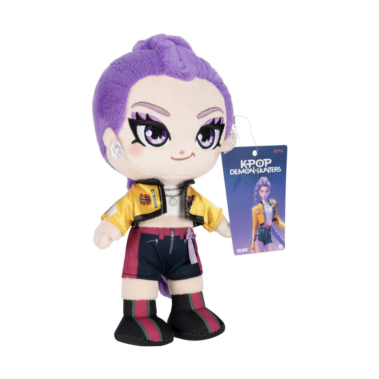 Peluche con capelli viola, giacca gialla e pantaloncini a righe.
