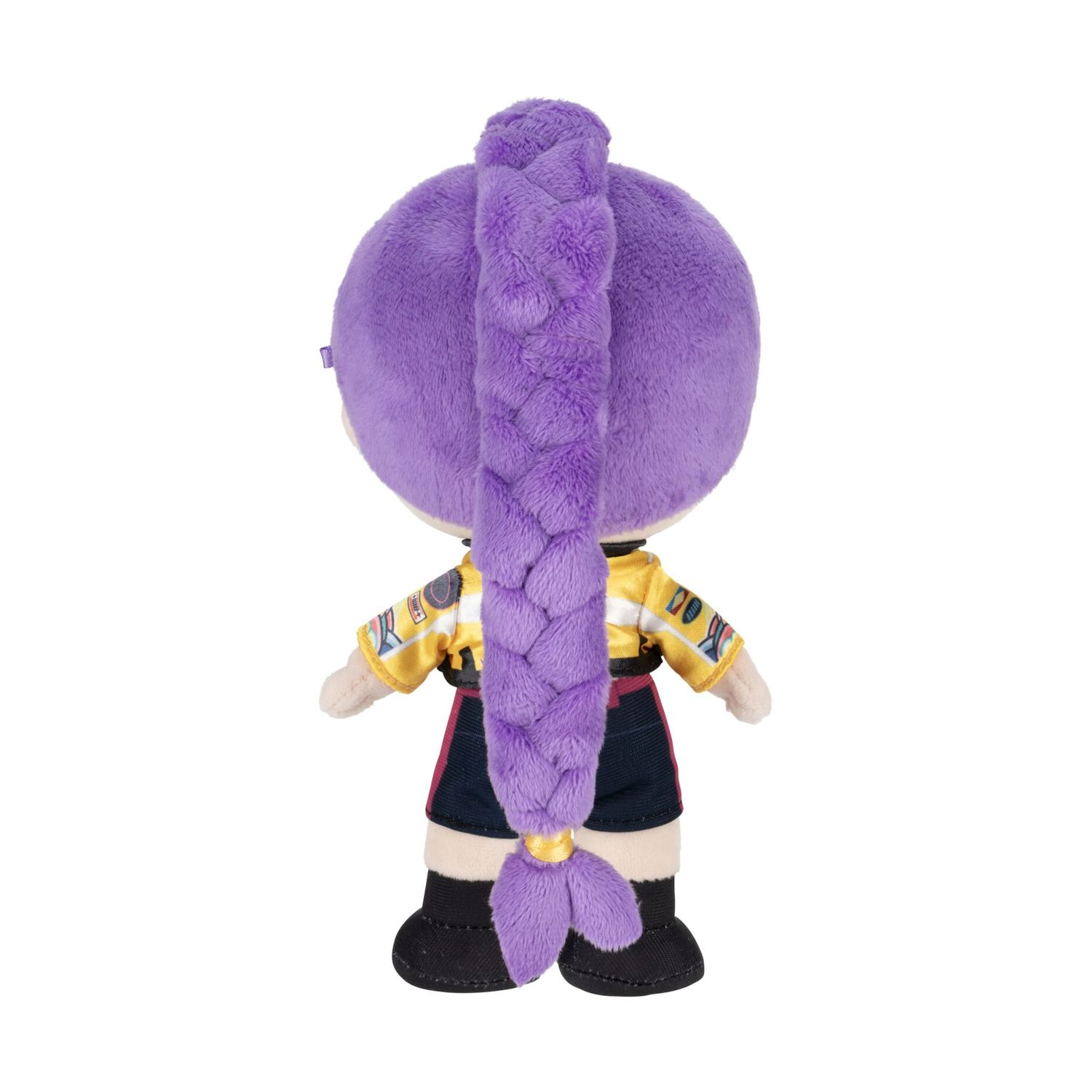 Vista posteriore di bambola di peluche viola con capelli intrecciati, giacca gialla e pantaloncini.