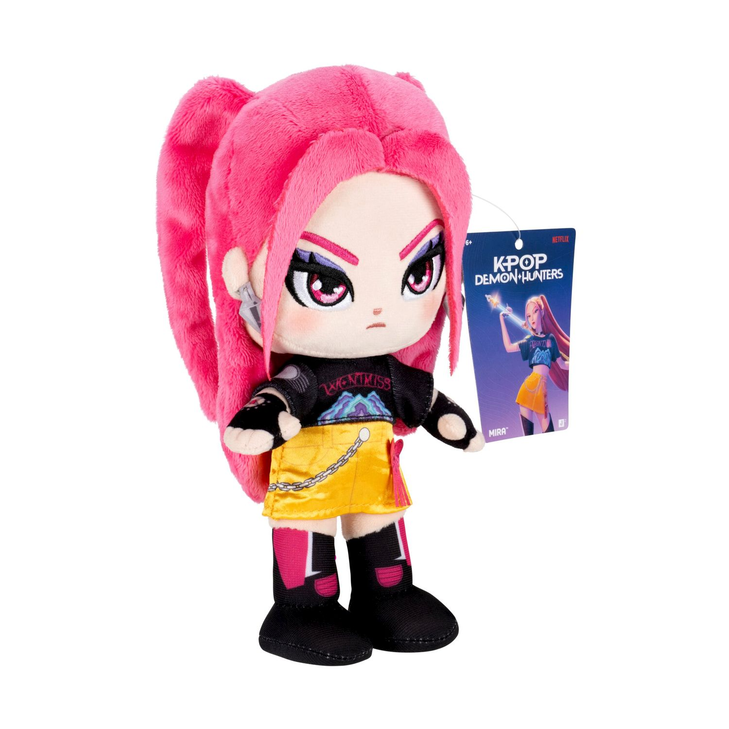Peluche con capelli rosa, gonna gialla e vestiti neri.