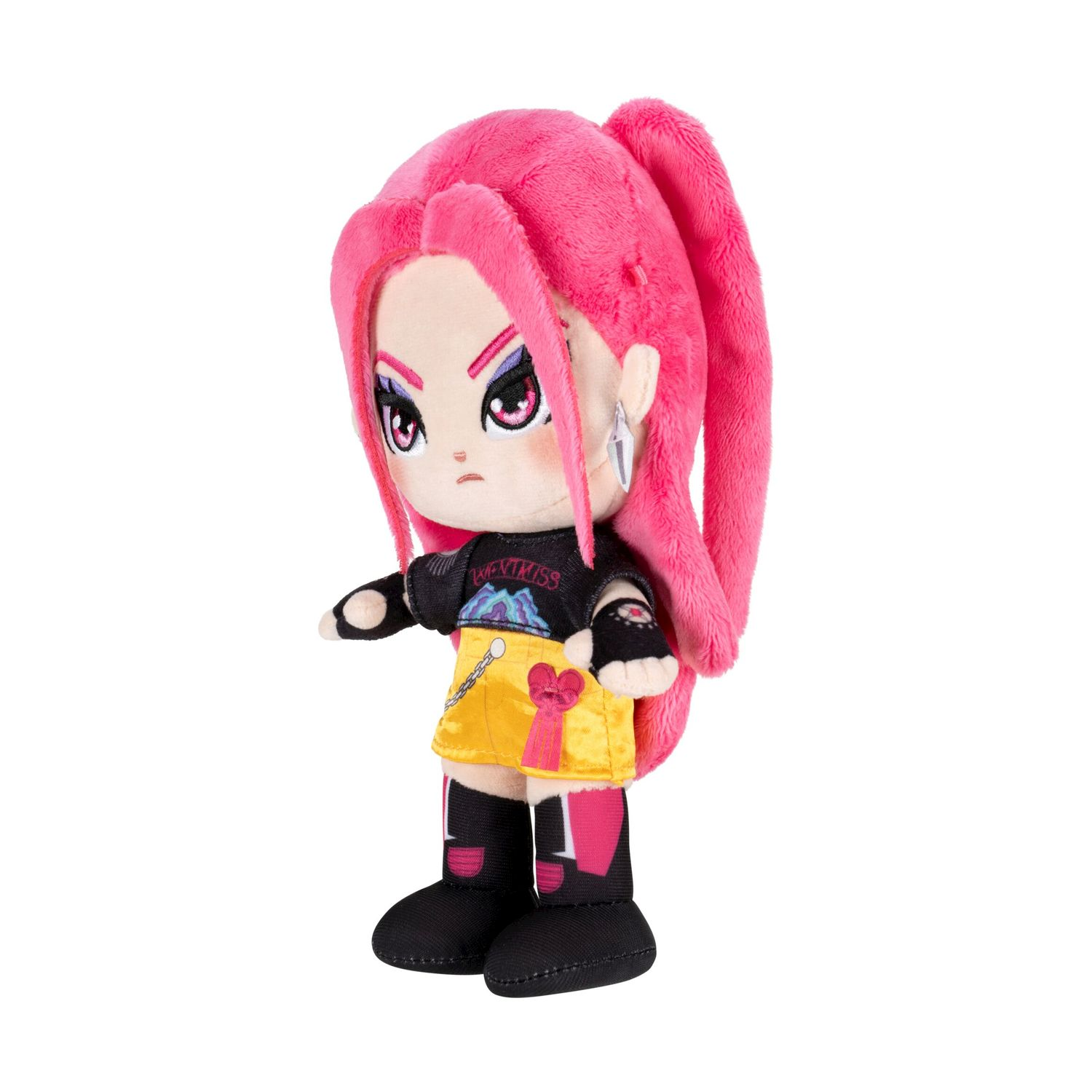 Peluche con capelli rosa, gonna gialla e vestiti neri.