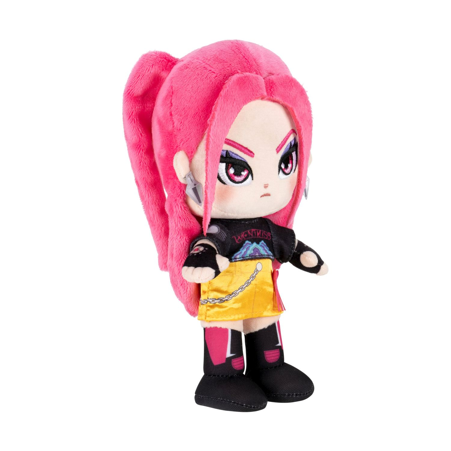 Un peluche con capelli rosa, gonna gialla e vestiti neri.