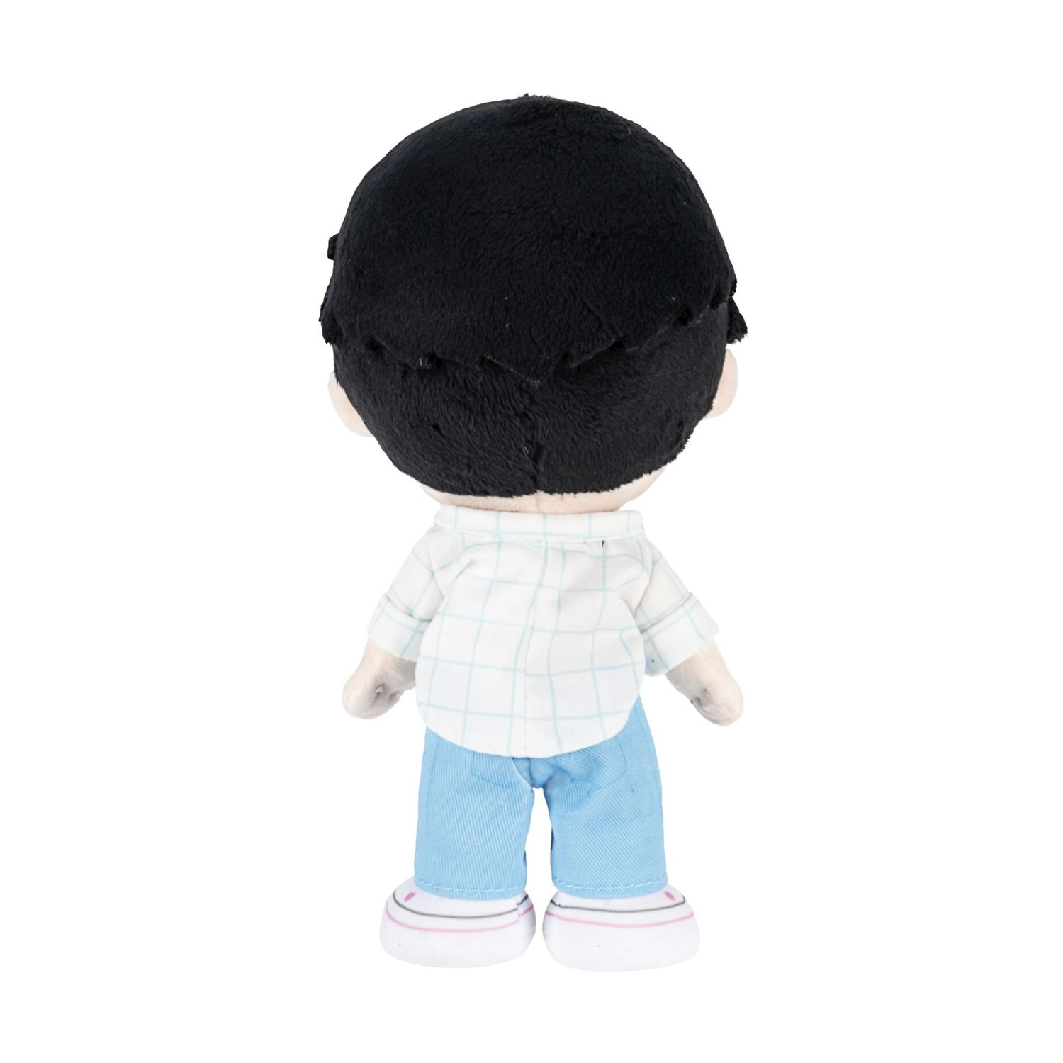 Vista posteriore di un peluche con capelli neri, camicia a quadri e pantaloni blu.