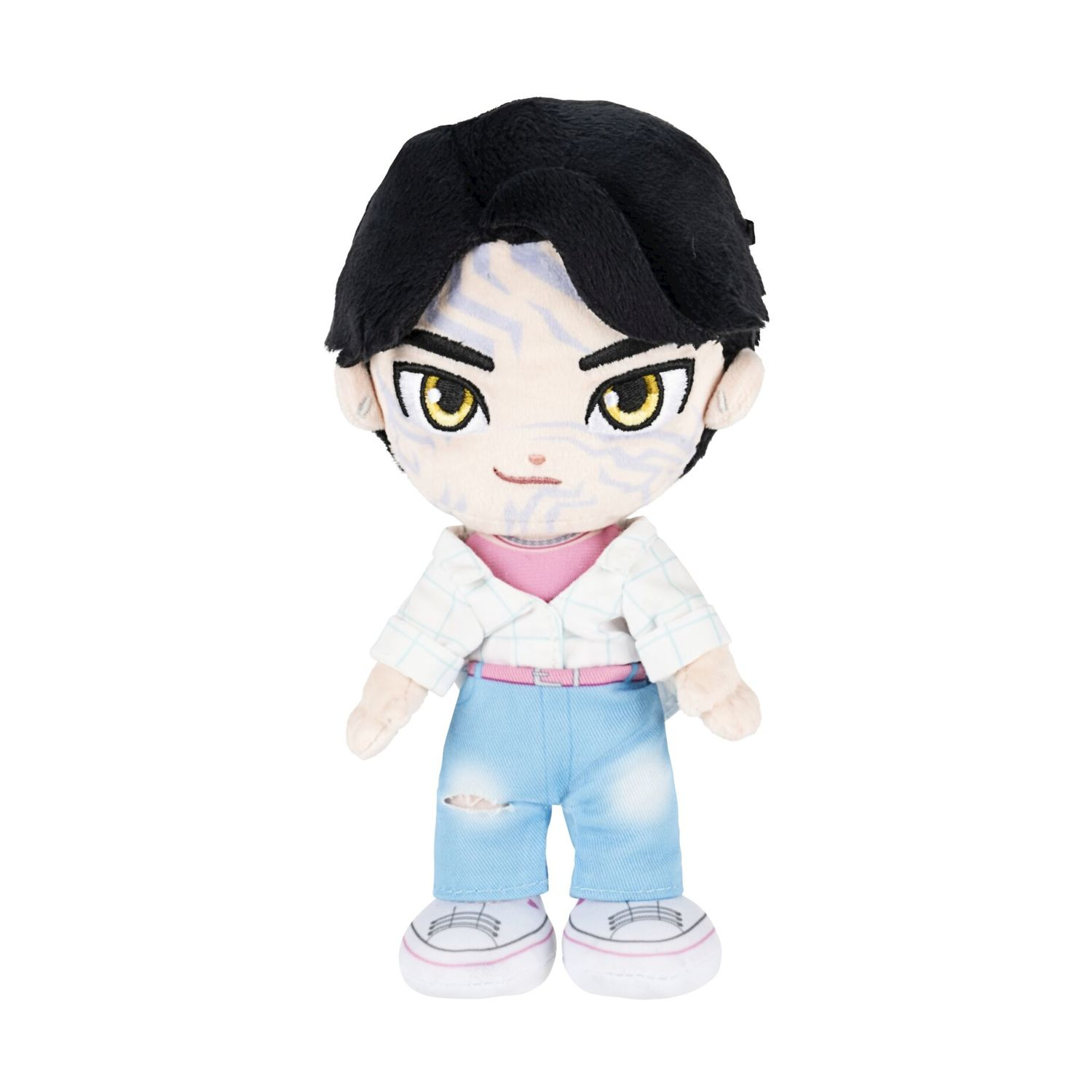 Peluche di un ragazzo con capelli neri, jeans blu e camicia a quadri.