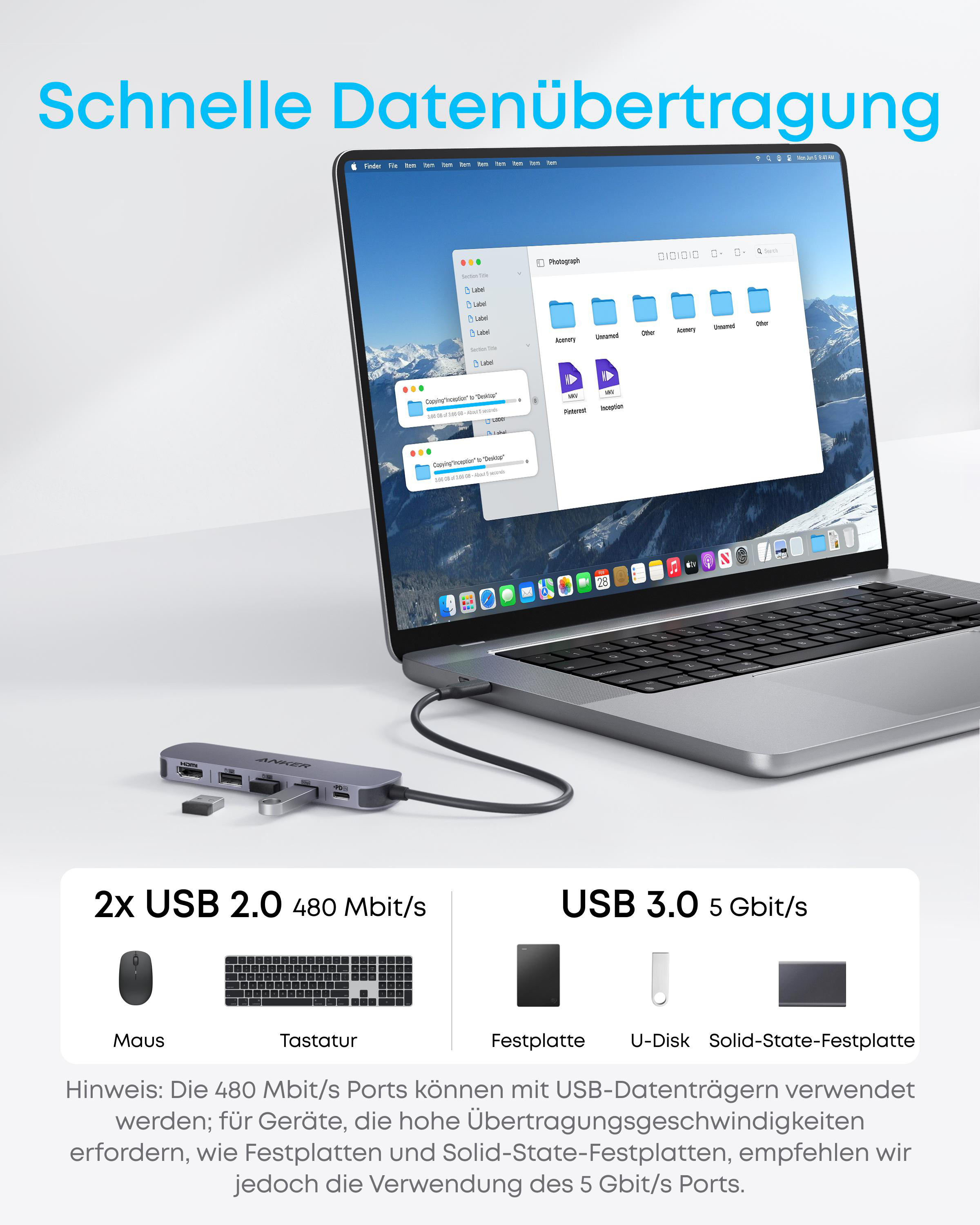 Ein Laptop zeigt einen Ordner mit Dateien und einen USB-Hub mit Anschlüssen.