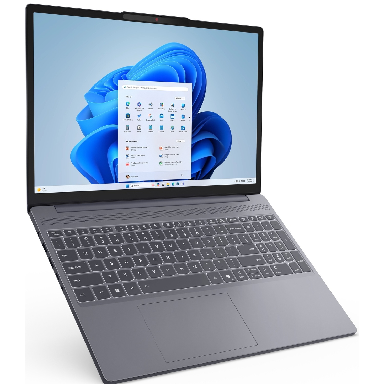 Een grijze laptop met een verlicht toetsenbord toont het Startmenu van Windows 11.