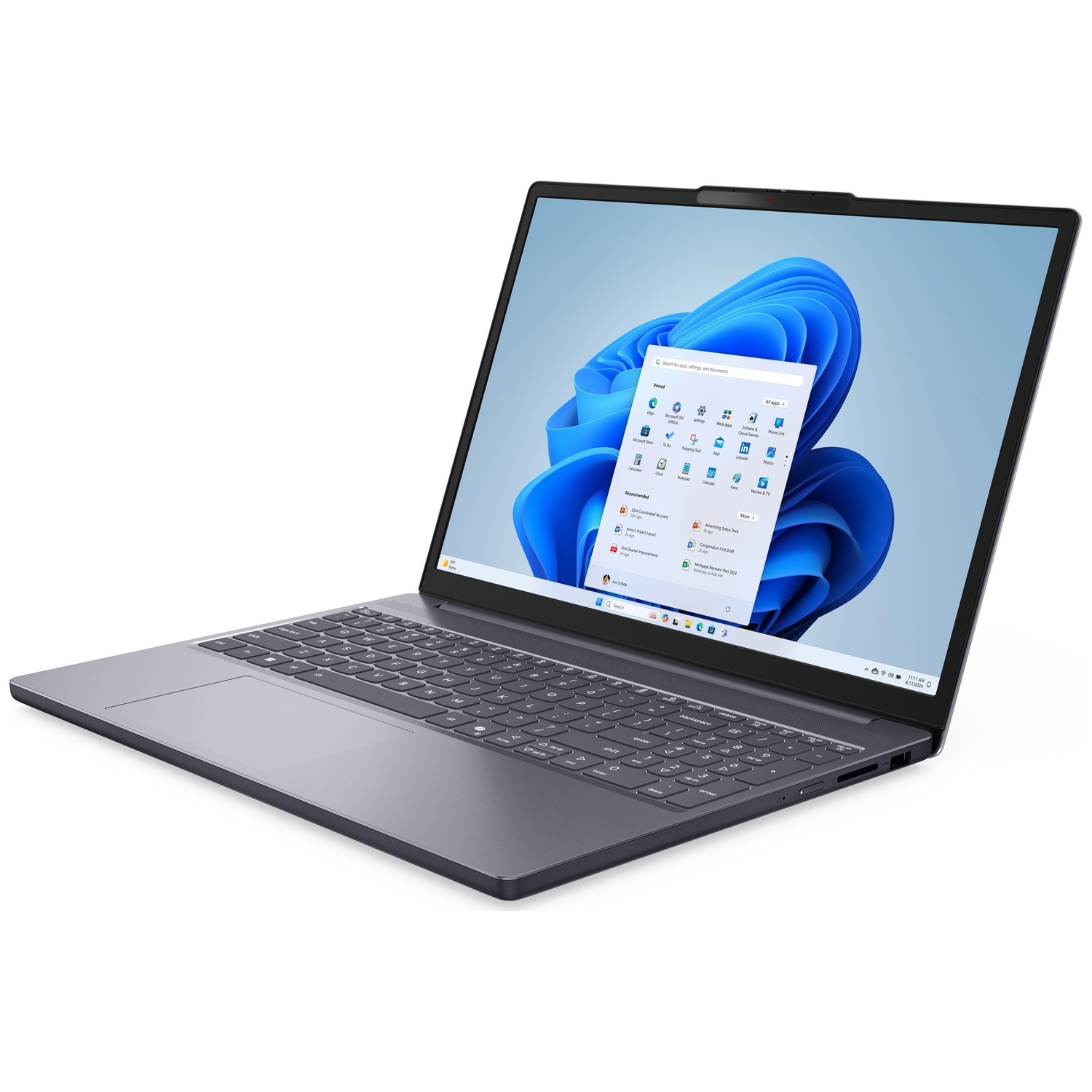 Een grijze laptop met een geopend Windows 11 startmenu op het scherm.