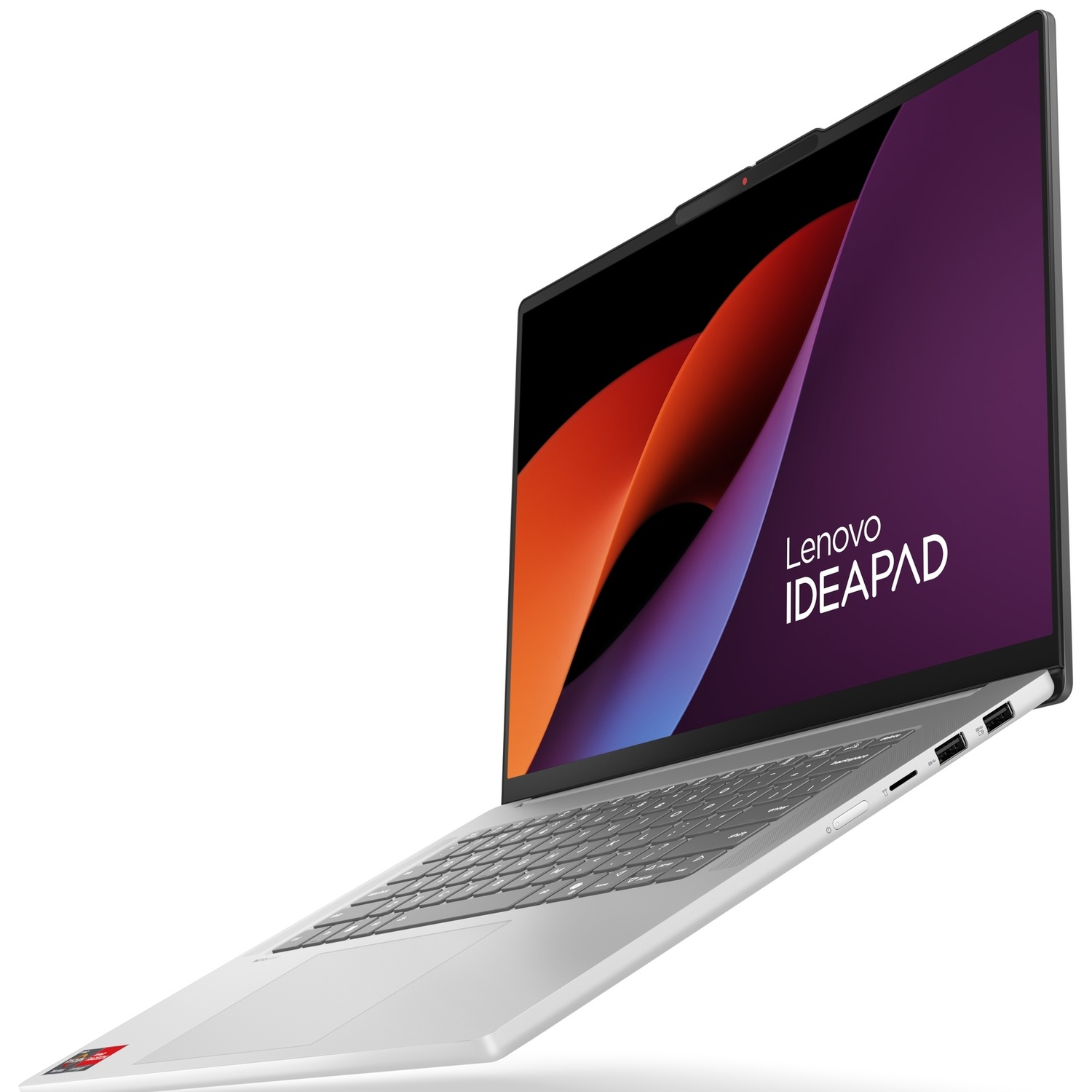 Un ordinateur portable Lenovo IdeaPad argenté affichant un fond coloré à l'écran.