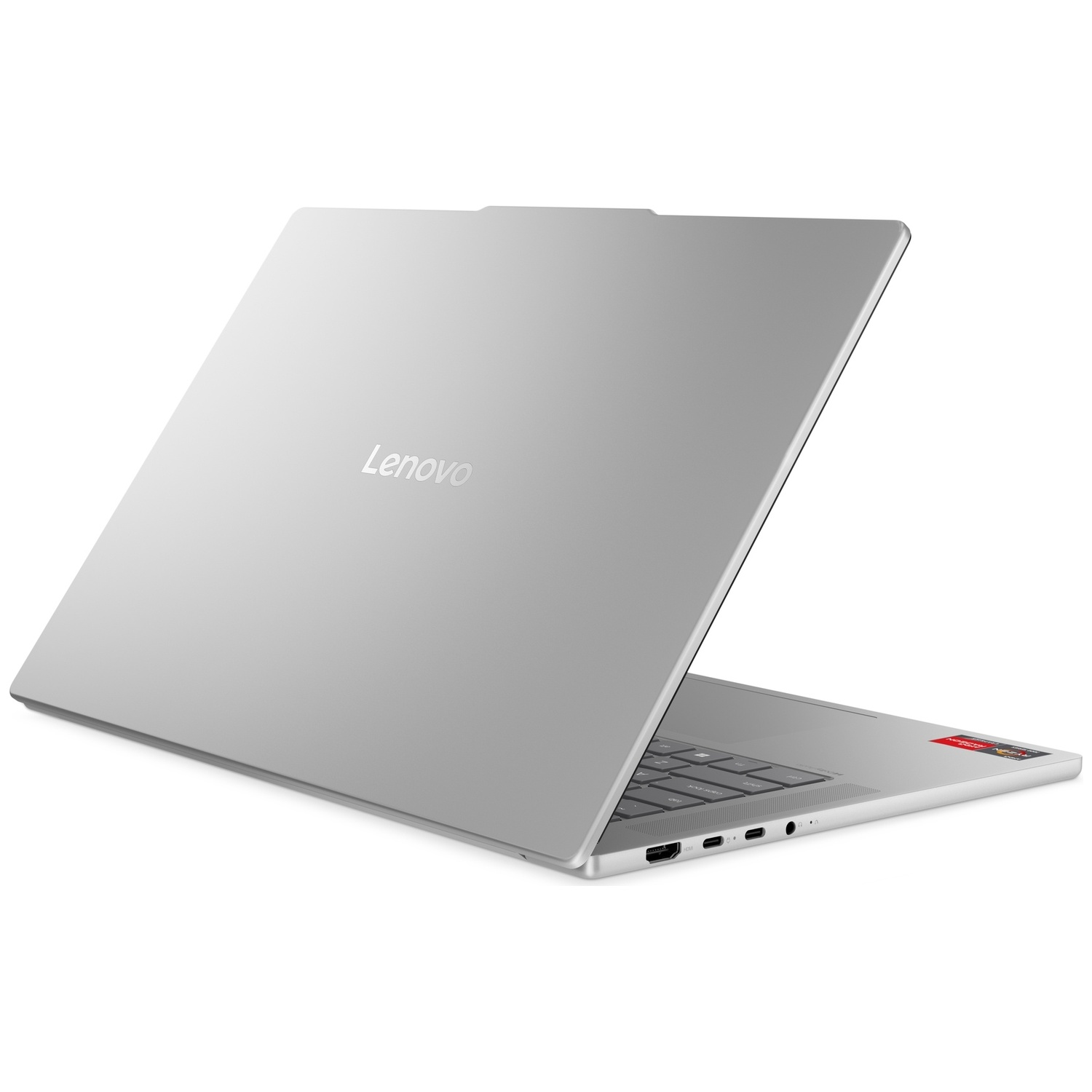 Un ordinateur portable Lenovo argenté, couvercle ouvert, clavier et ports visibles.