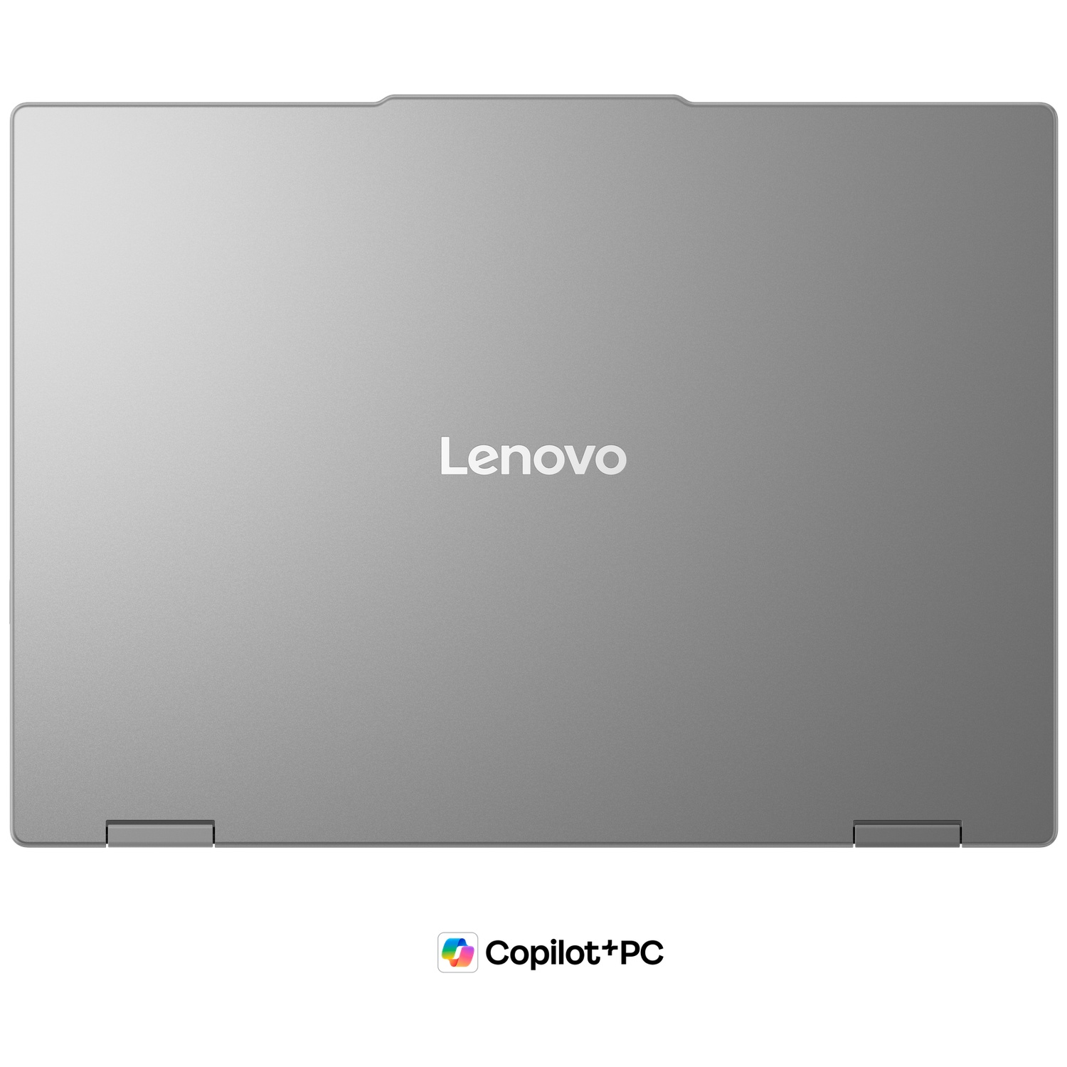 Ordinateur portable argenté fermé avec logo Lenovo et icône Copilot+PC.