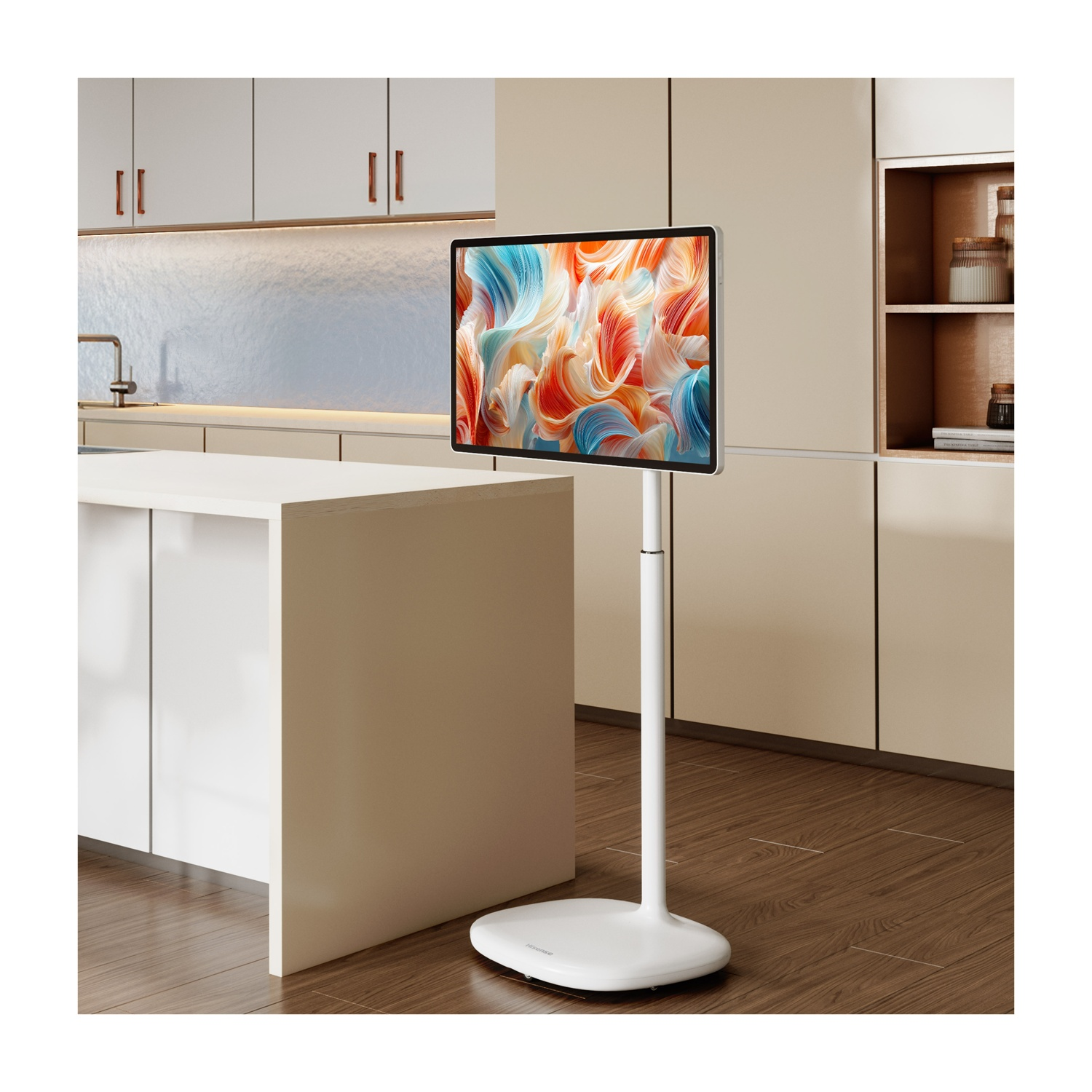 Un televisore bianco su un supporto in una cucina moderna.