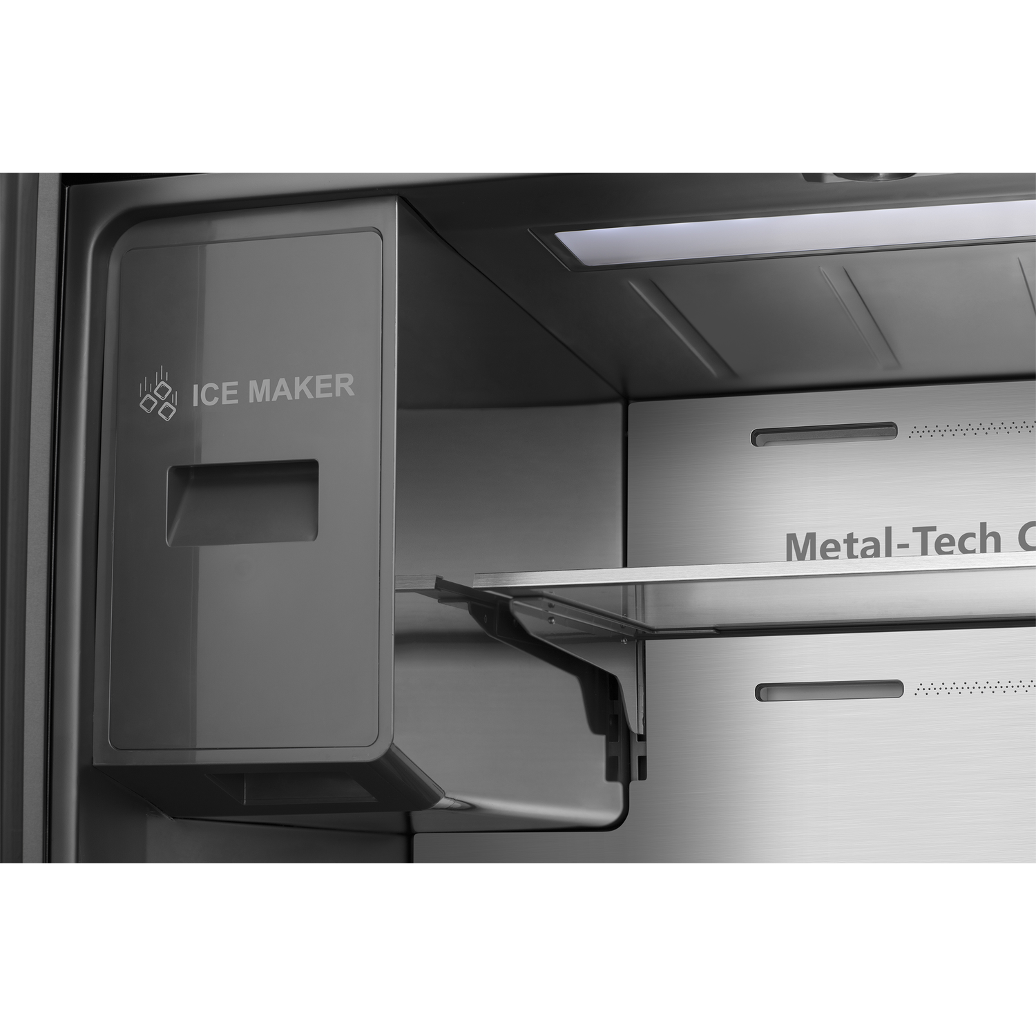 Ice maker and metal shelf inside a refrigerator.