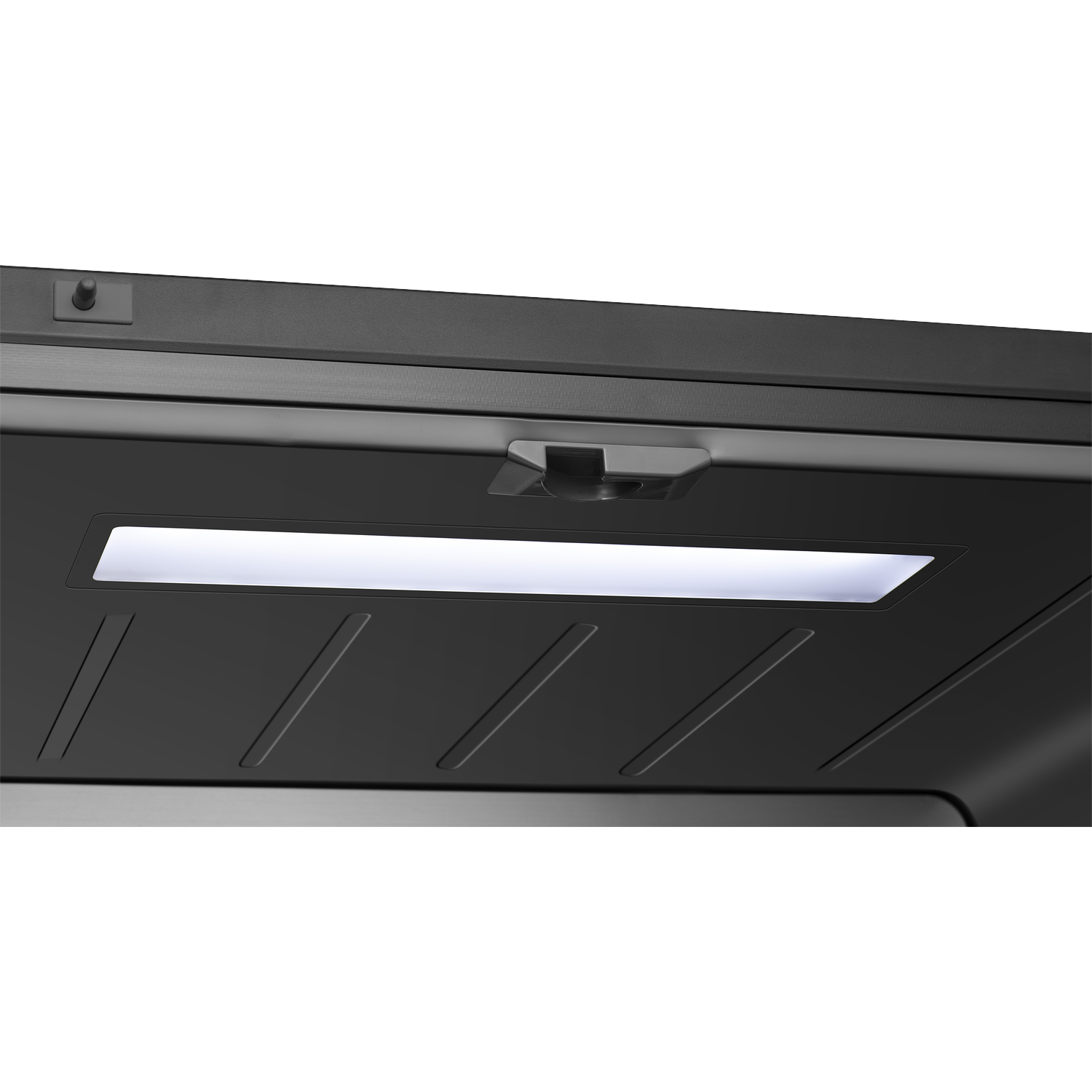 Interior view of a refrigerator with a bright LED light strip illuminating the top shelf.