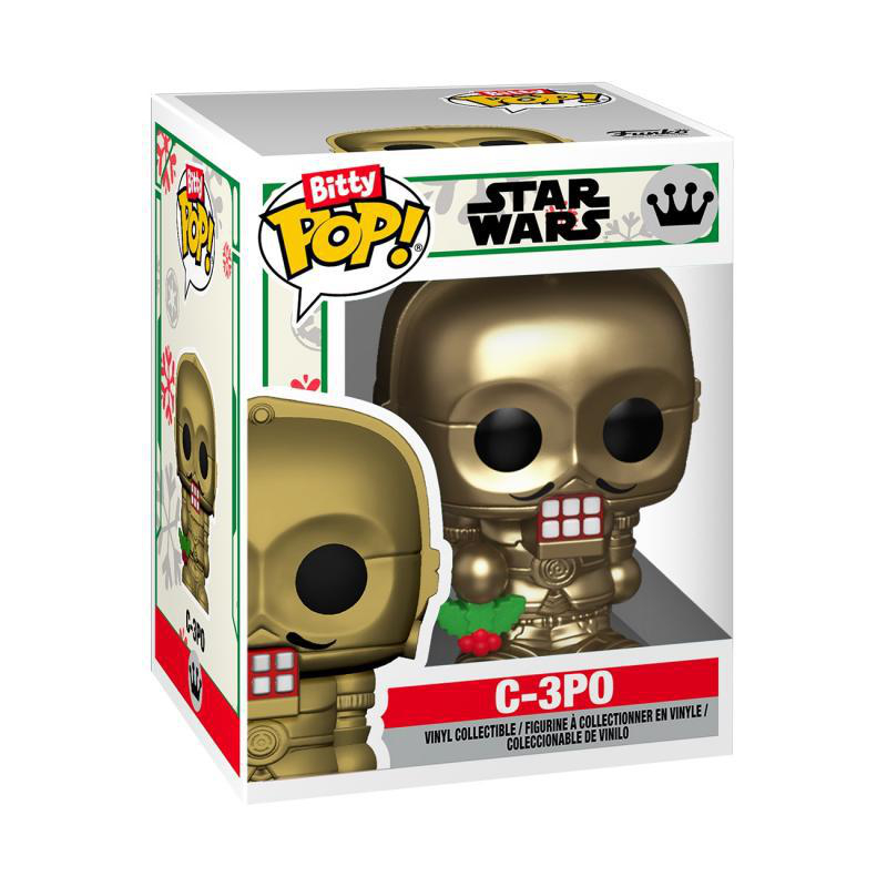 Goldene C-3PO Funko Pop! Figur im Karton mit Weihnachtsdekoration.