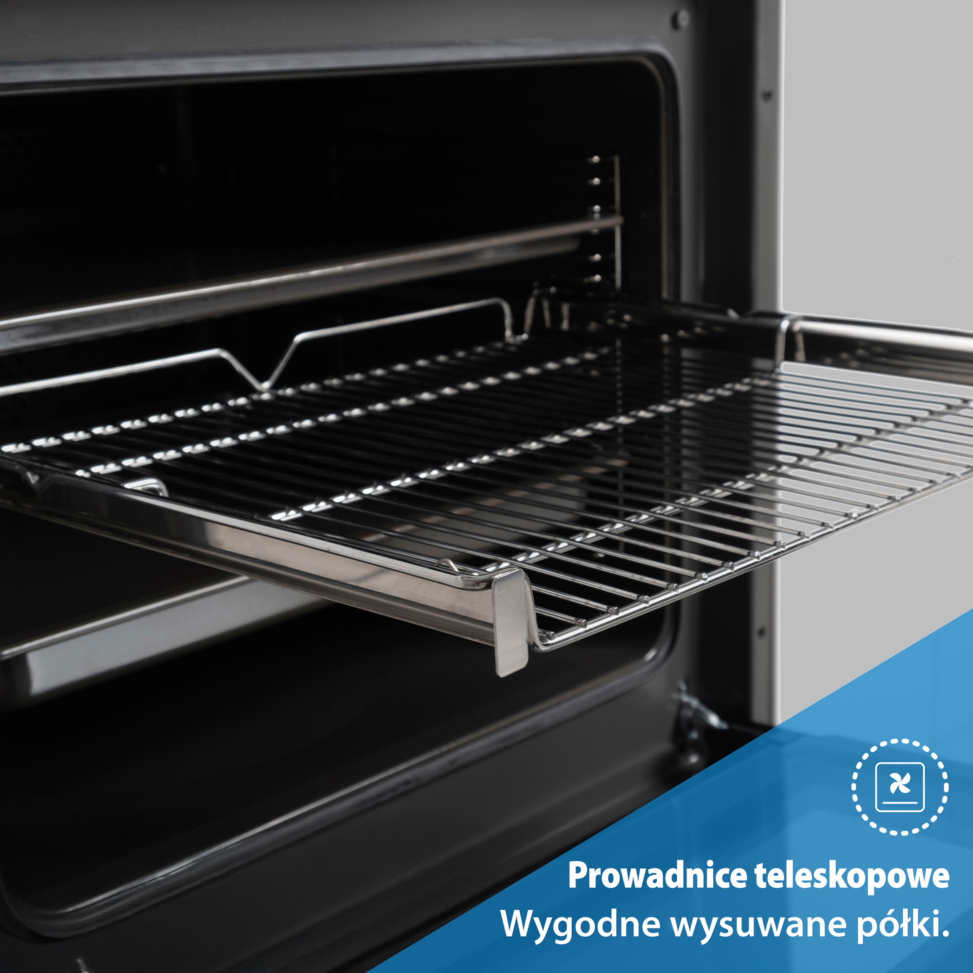 Wysuwana metalowa prowadnica teleskopowa piekarnika w nowoczesnym piekarniku.
