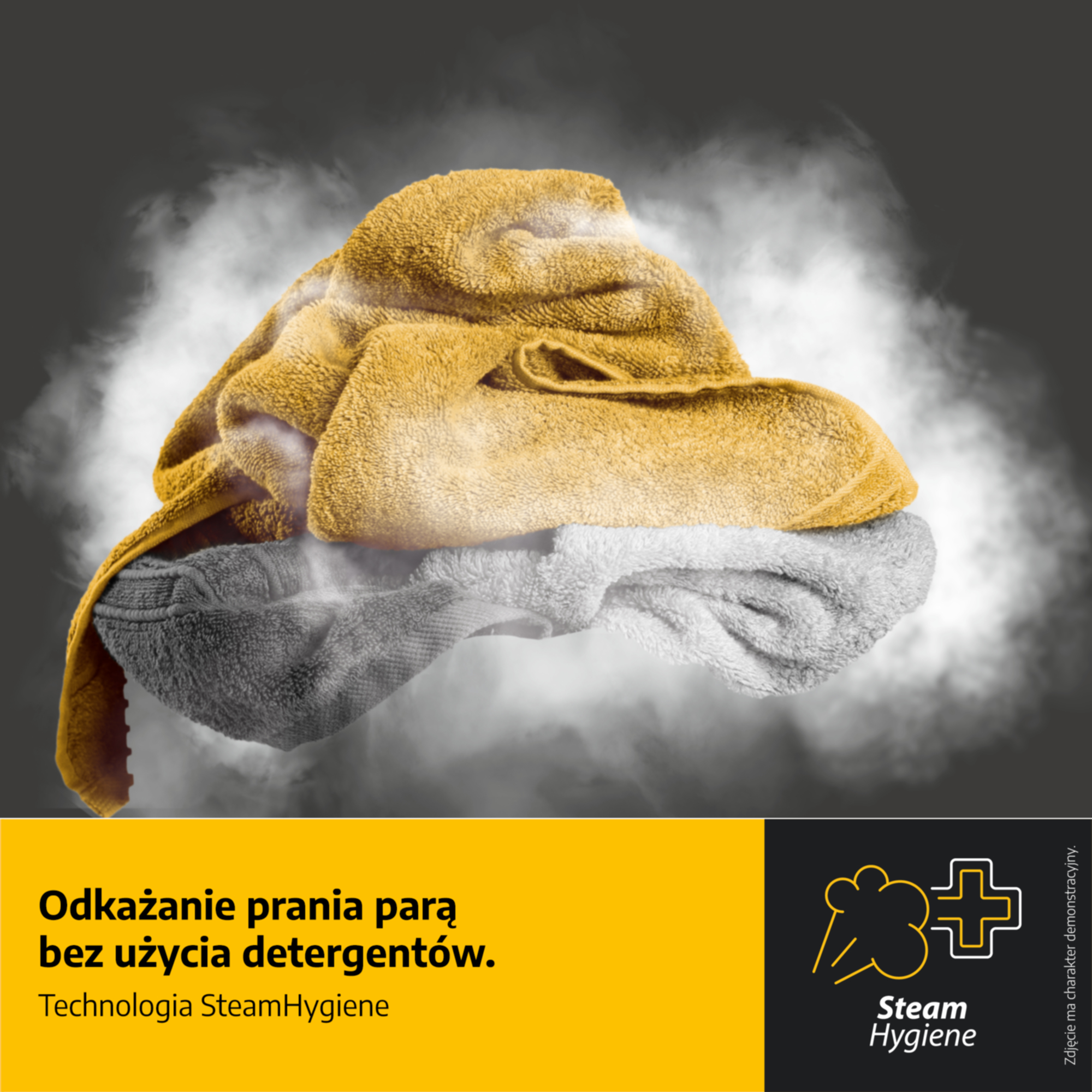 Żółte i szare ręczniki otoczone parą unoszącą się z centrum.