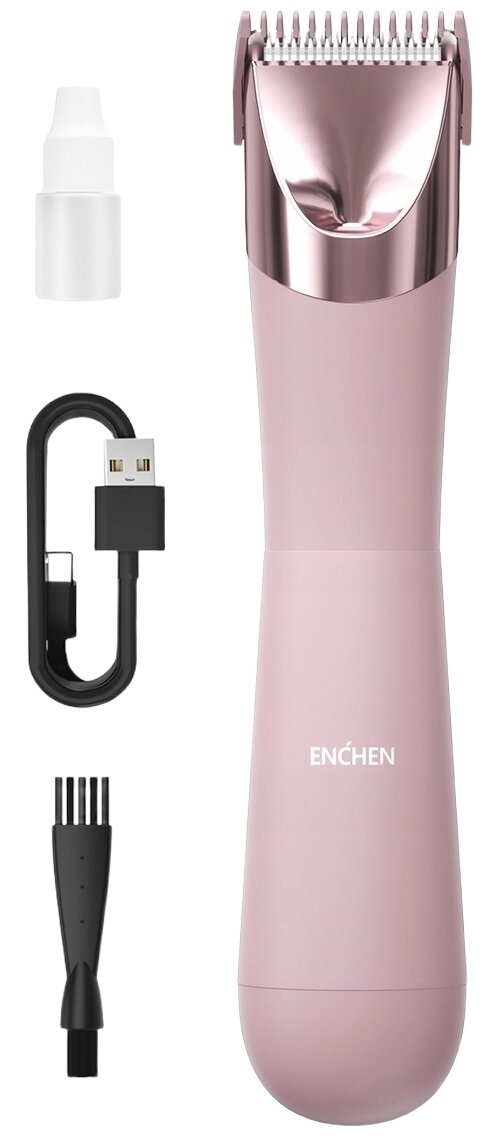 Różowa maszynka do strzyżenia włosów z akcesoriami: butelka z olejem, kabel USB, szczotka.