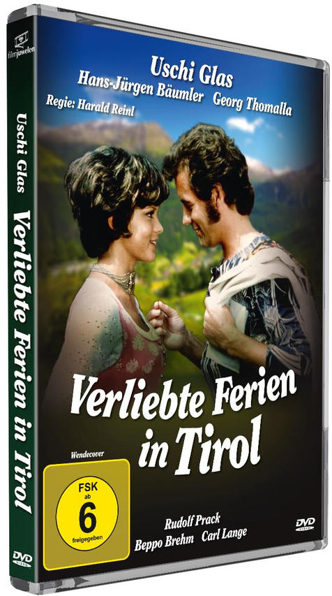 DVD-Cover: Ein Mann und eine Frau im Gespräch vor Bergkulisse. Titel: Verliebte Ferien in Tirol.