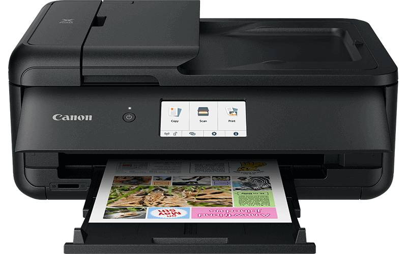 Una stampante Canon nera con touchscreen sta stampando un foglio.